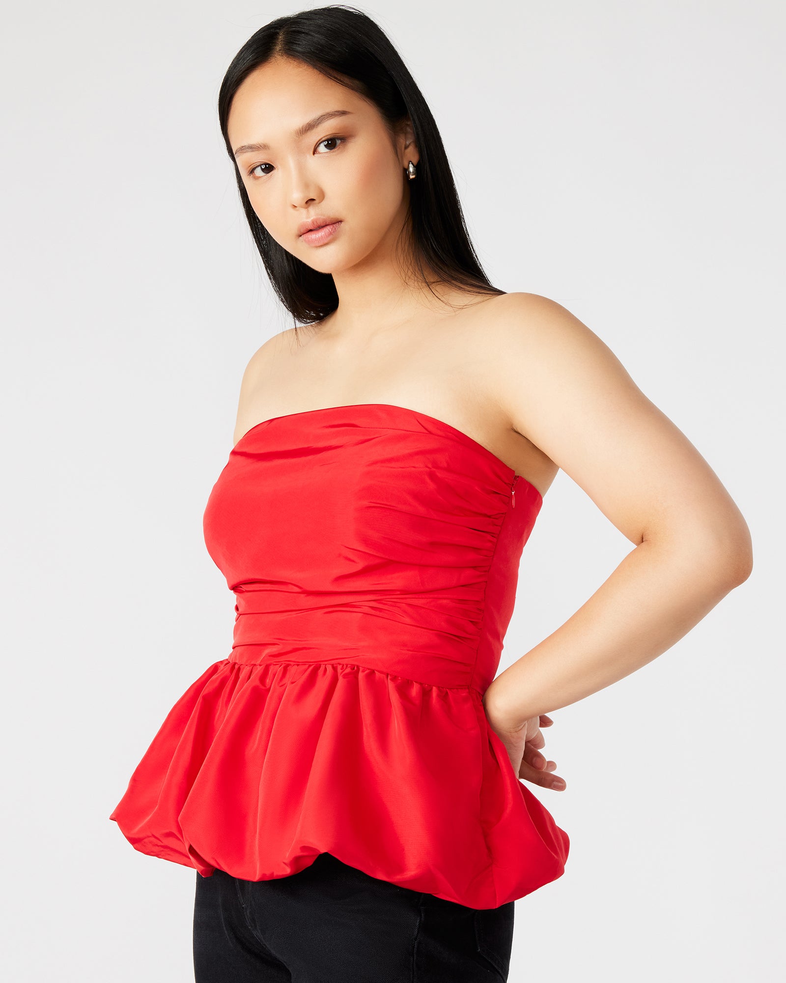 Back view of strapless top showing elastic trim, perfect for summer travel