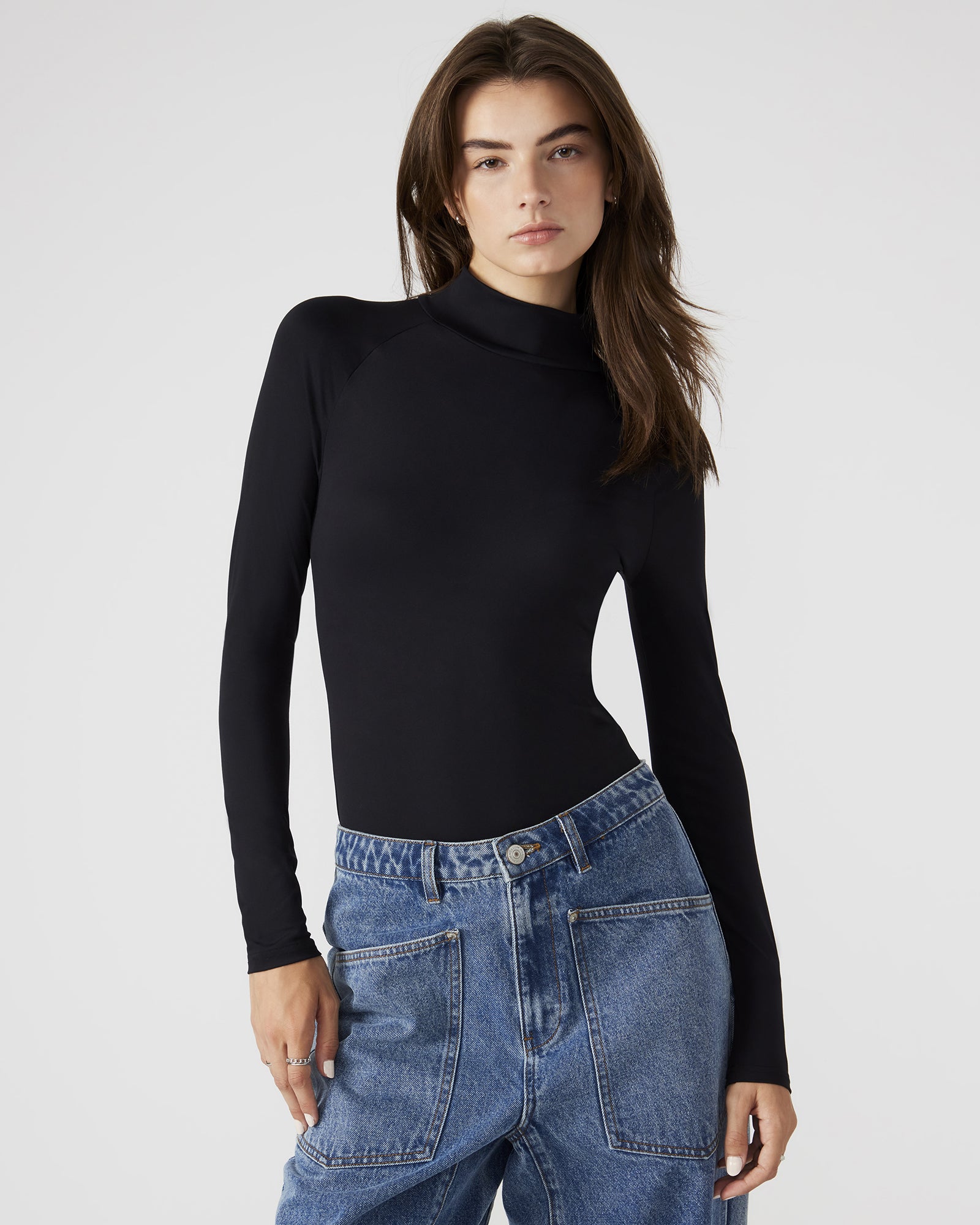 Front view of the black long sleeve bodysuit showing the mock neck design
