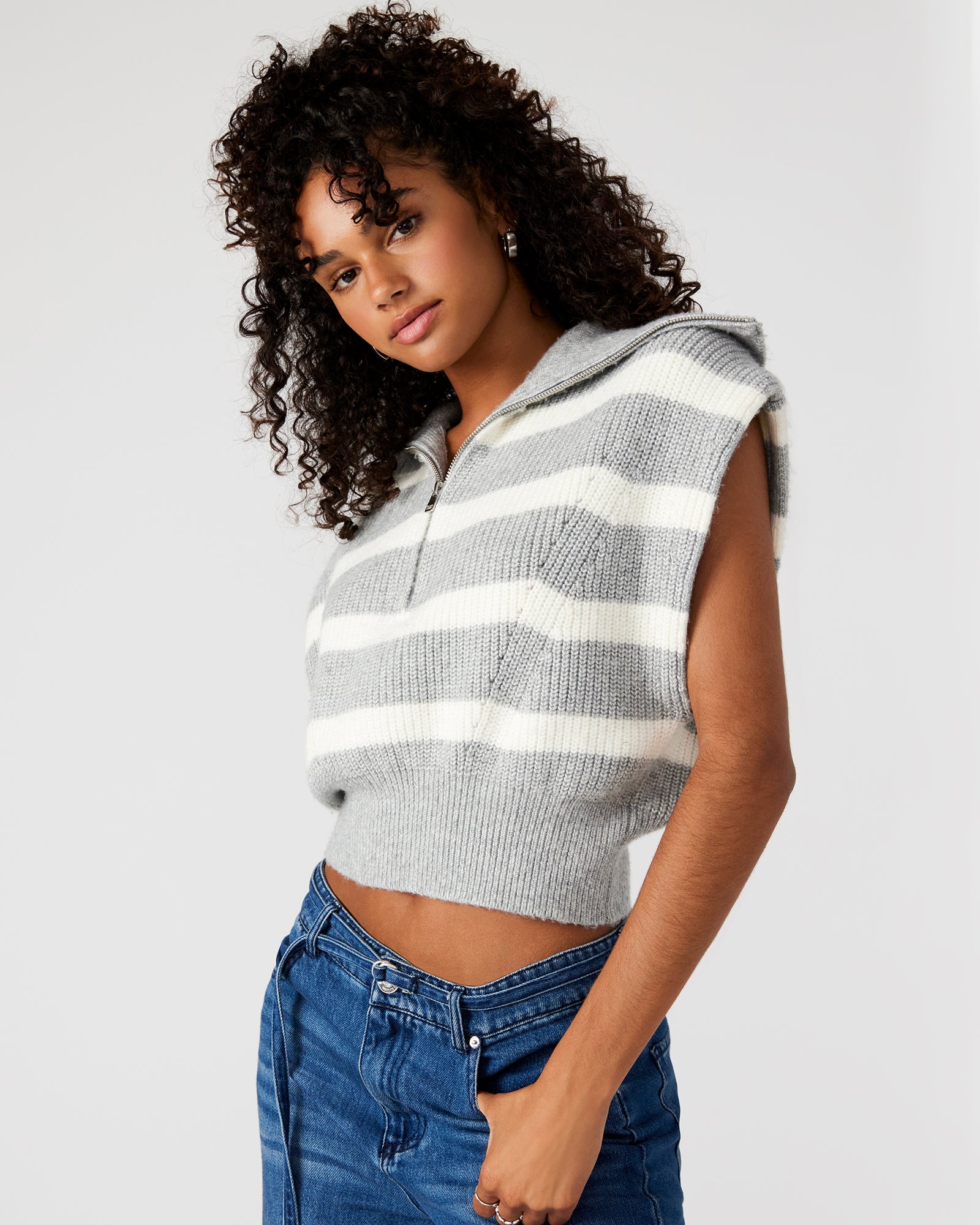 Styled look: EASTON hooded sweater layered over black base outfit for city-ready vibes.