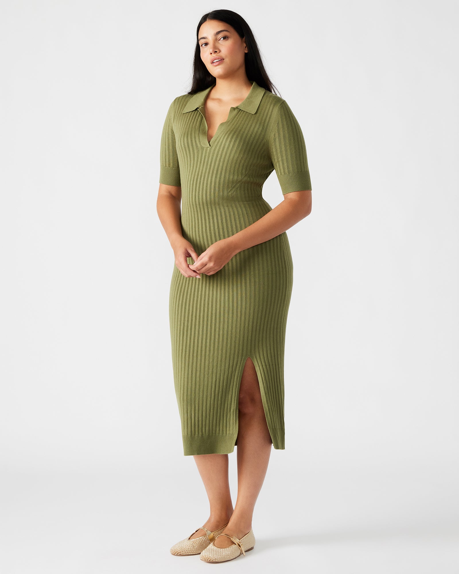 Olive green short sleeve dress displayed in a bright setting.