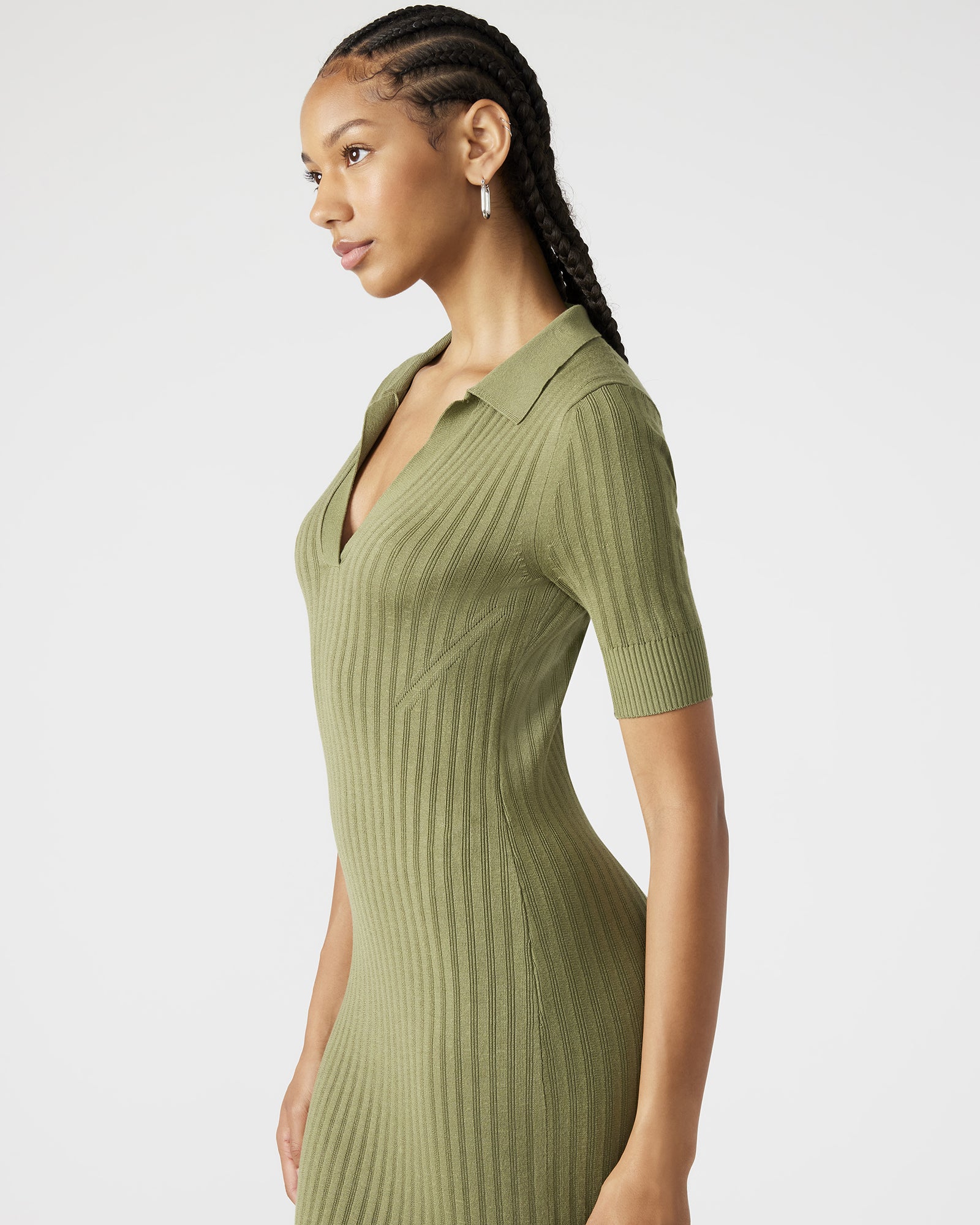 Olive green short sleeve dress displayed in a bright setting.