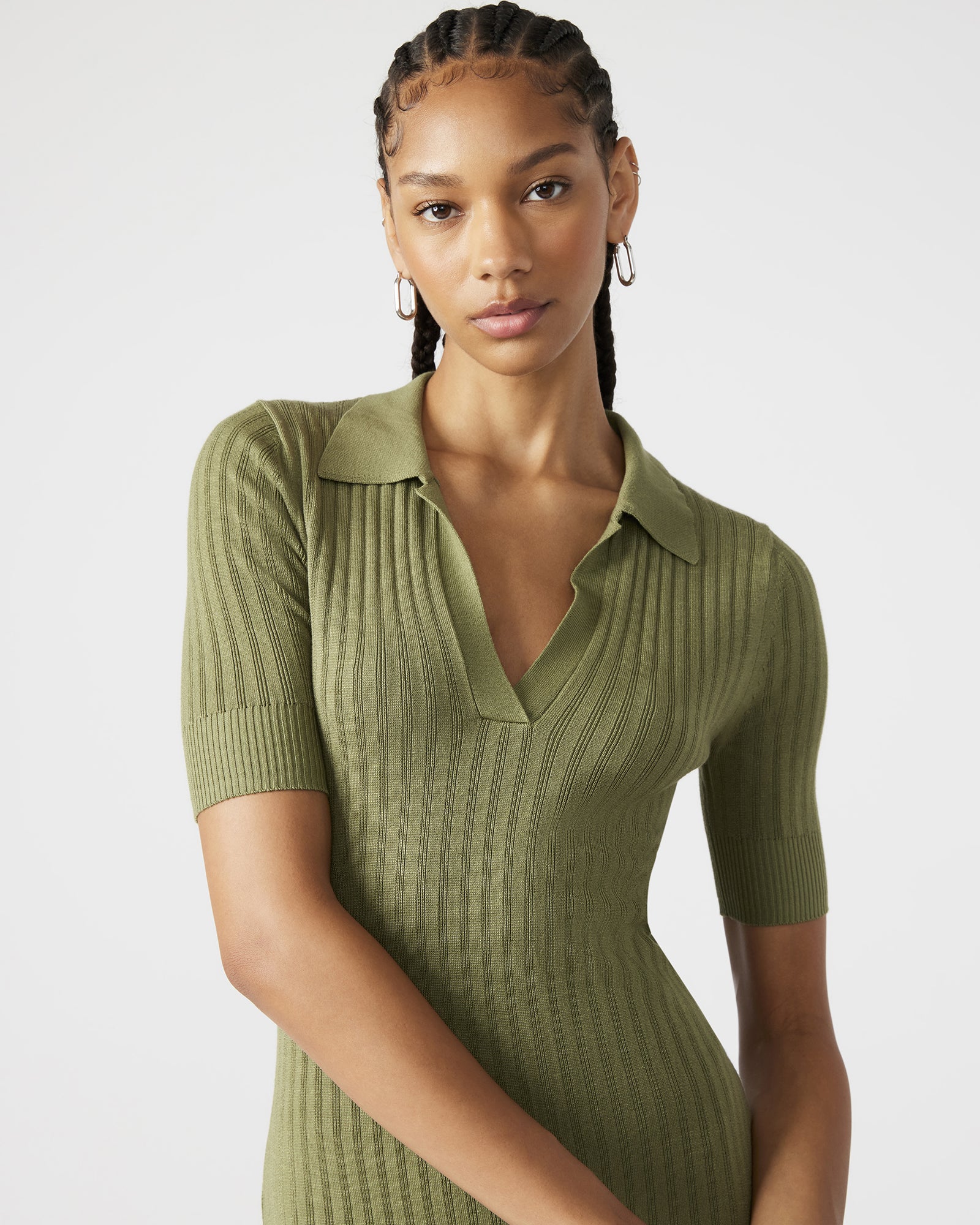 Close-up of the collared neckline on the olive green bridesmaid dress.