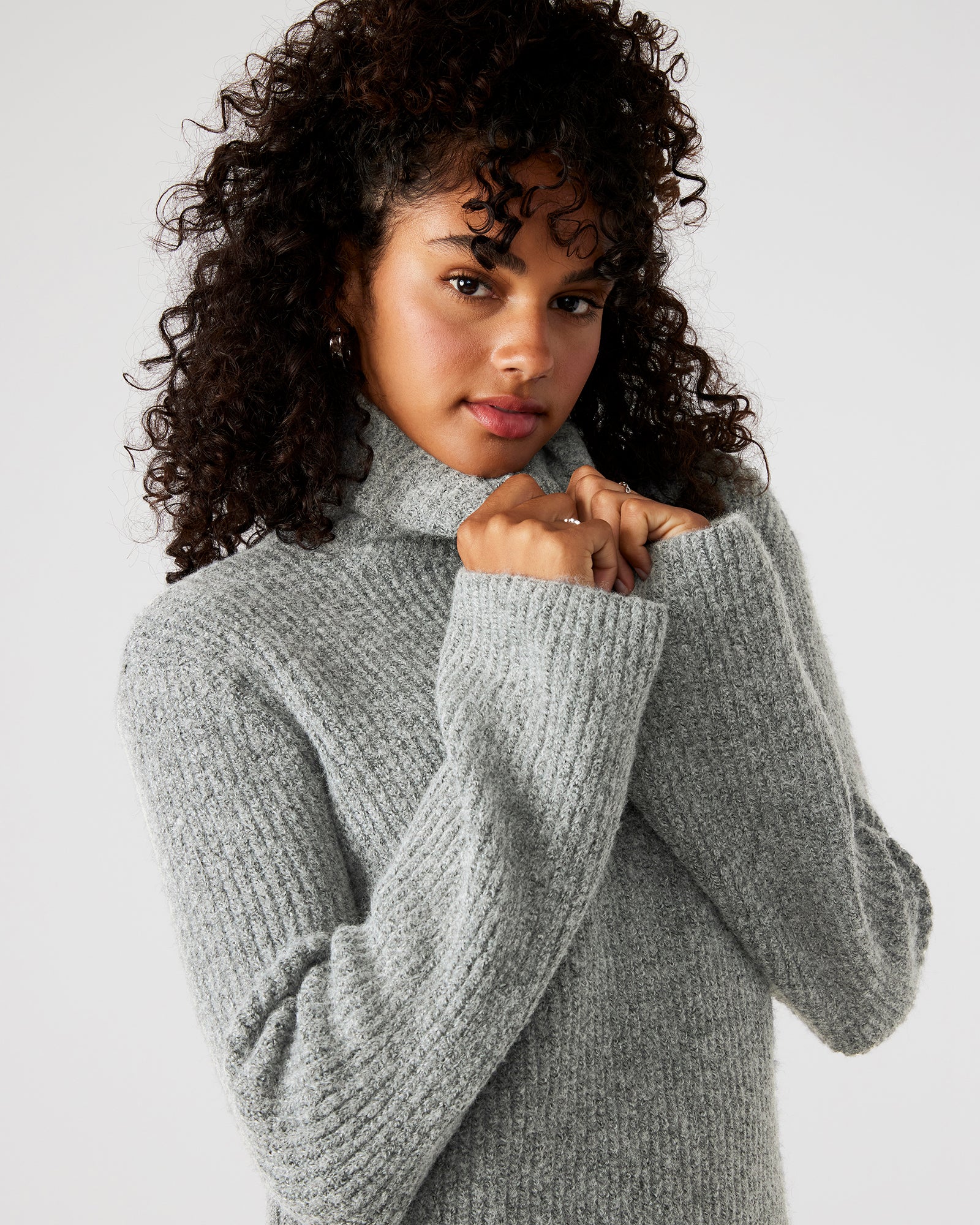 Front view of grey turtleneck mini sweater dress, ideal for casual outings.