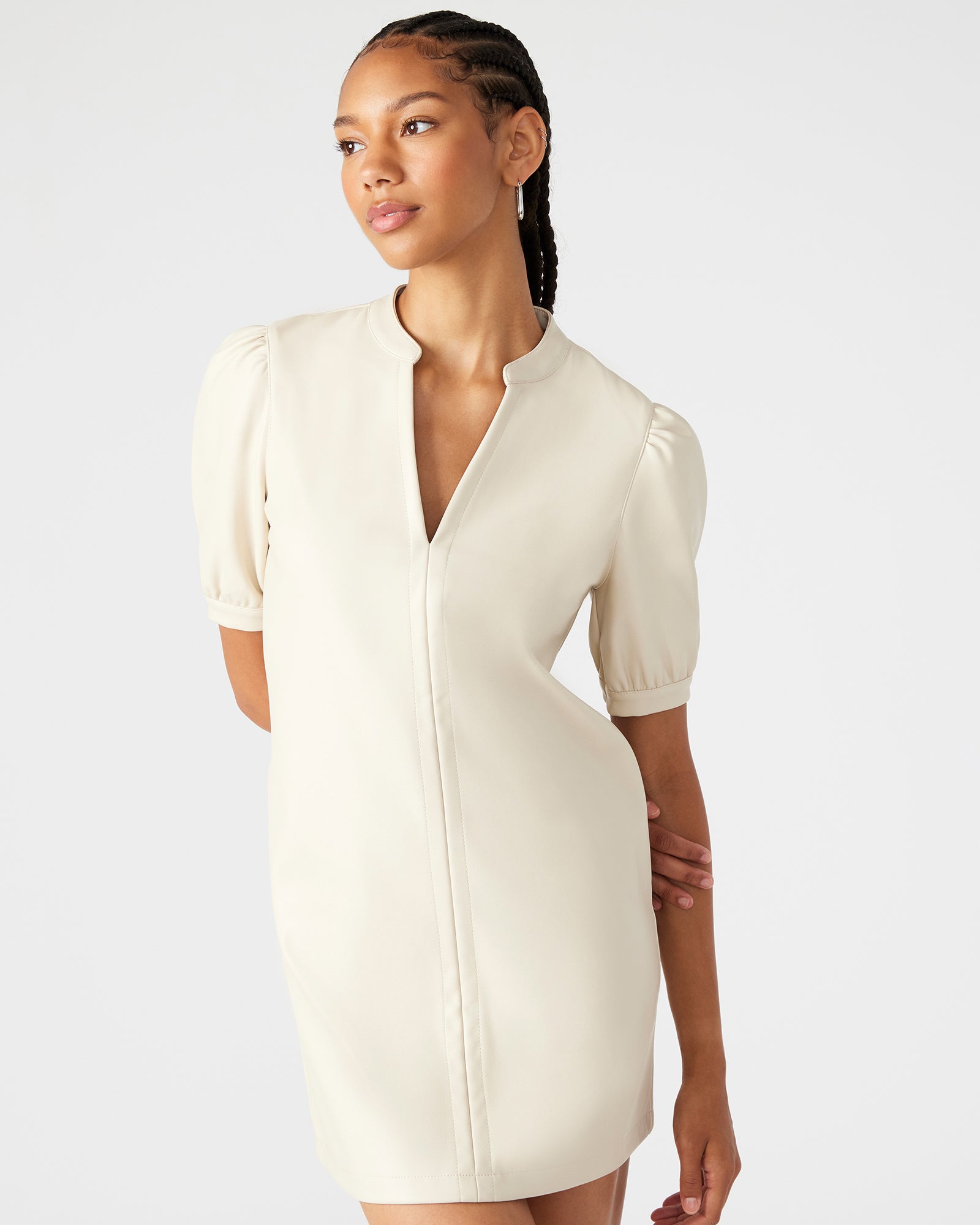Close-up of puff sleeves and neckline detail for casual elegance