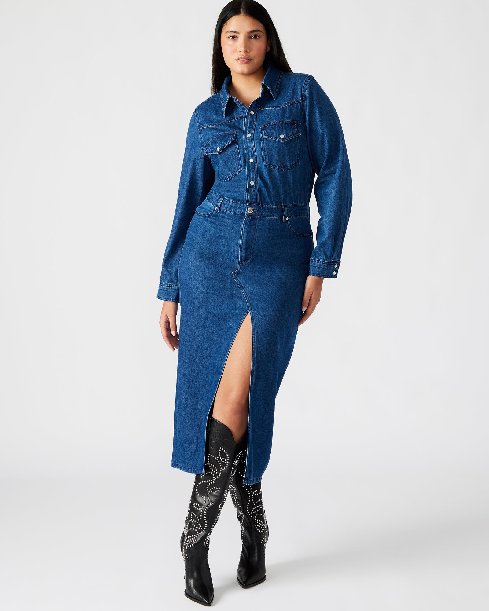 Close-up of the button-down front and pocket details on the denim dress