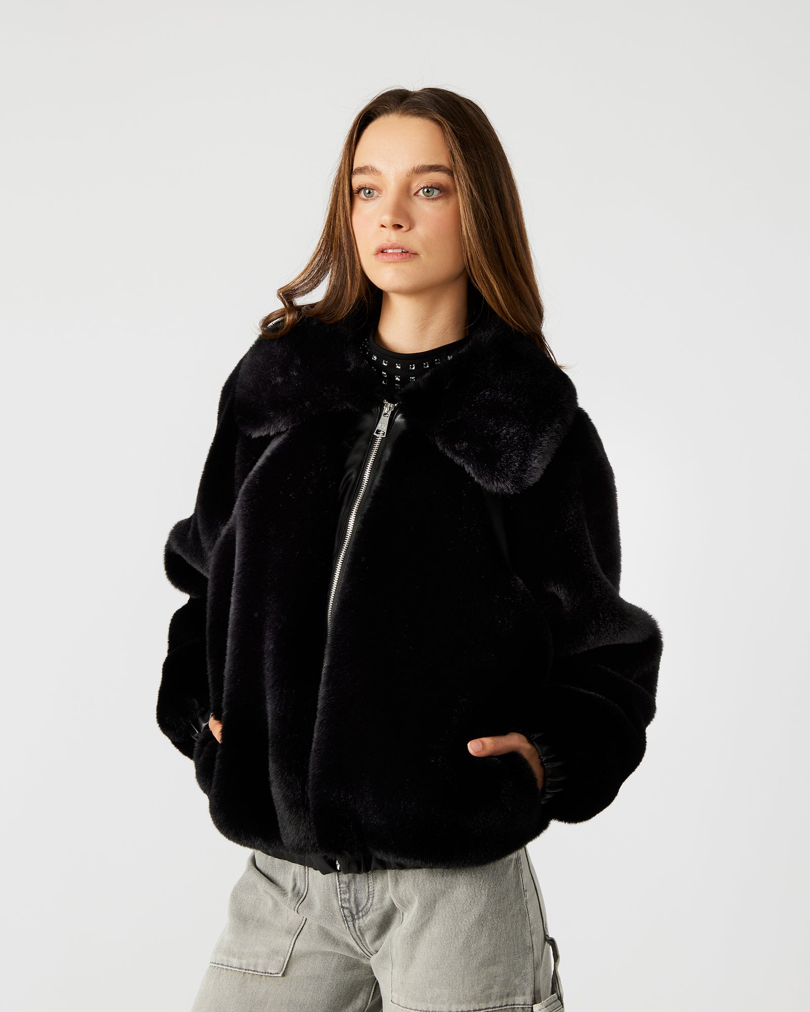 Front view of the Zephyr Luxe Furry Zip-Up Jacket in black, showcasing its stylish design.
