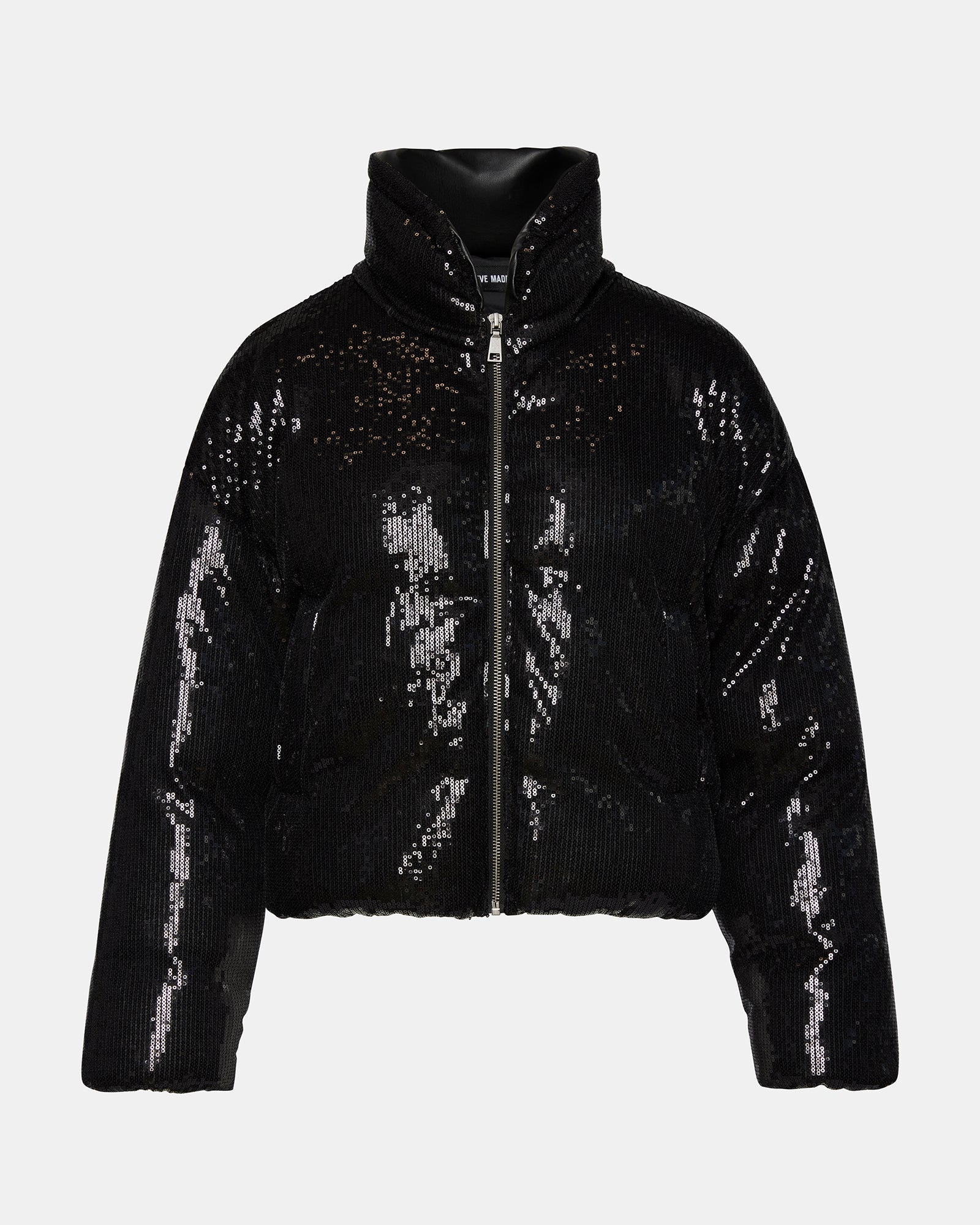 Side view of the womens black puffer jacket, highlighting its flattering fit.