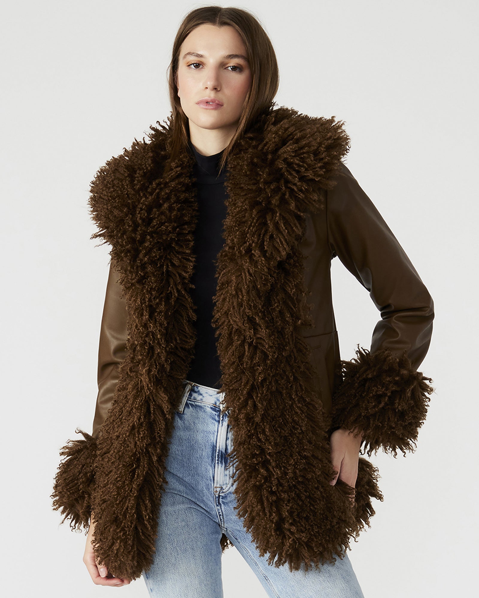 Model wearing faux leather bomber jacket women’s style, front view with fur trim detail