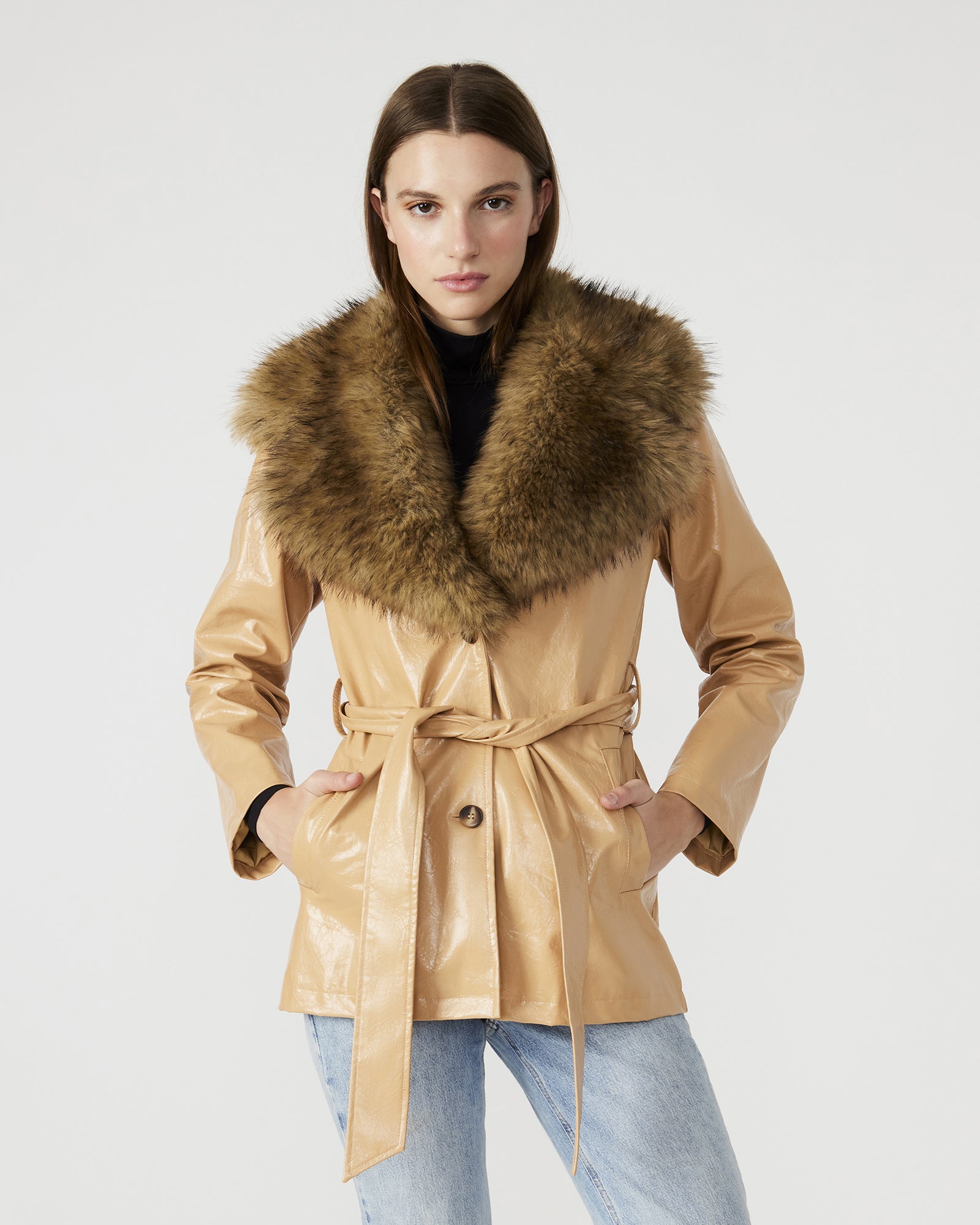 Side view of the tan coat women, highlighting the faux fur collar and button-up closure.