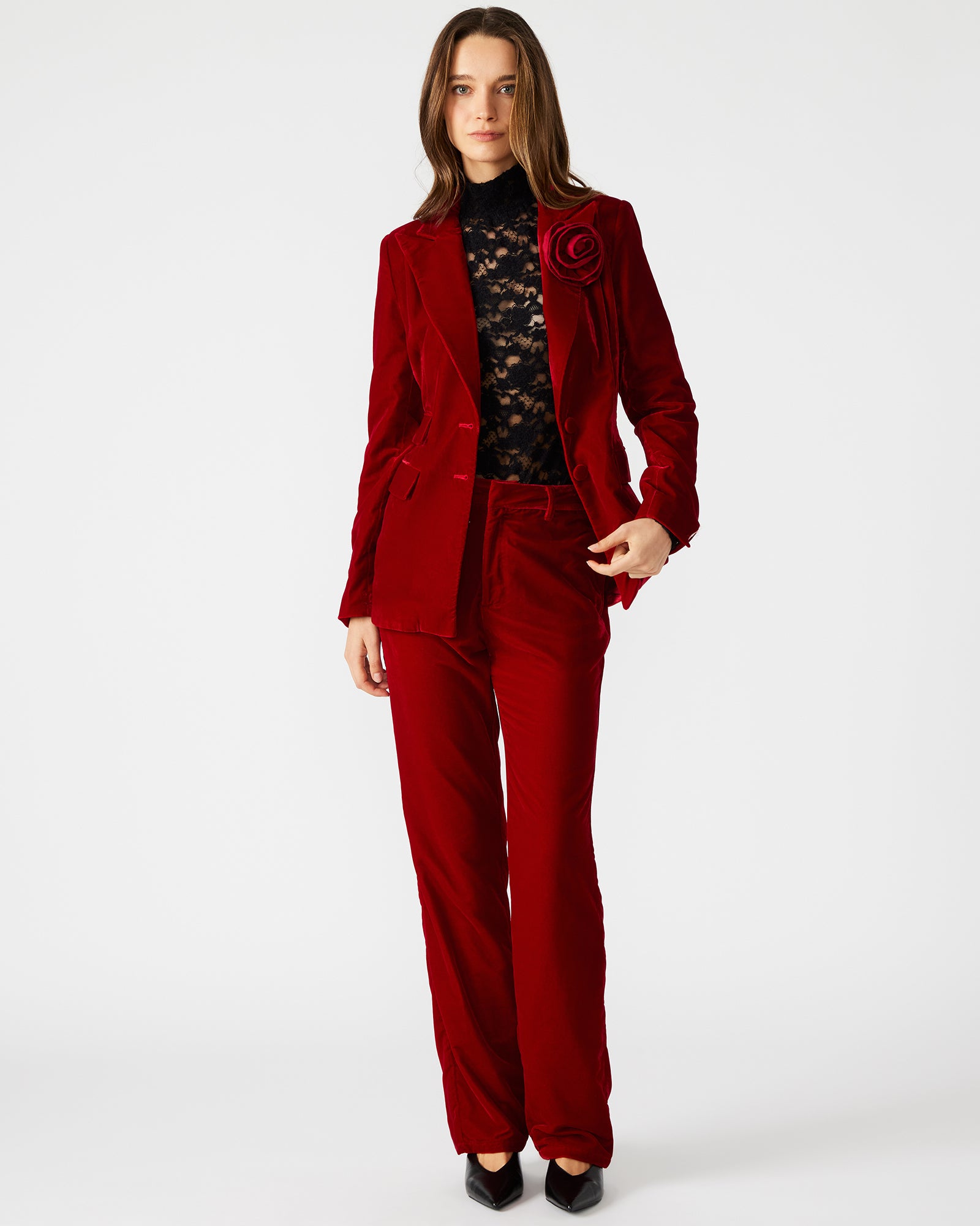 Front view of the elegant red velvet blazer for women, showcasing its rose decal.