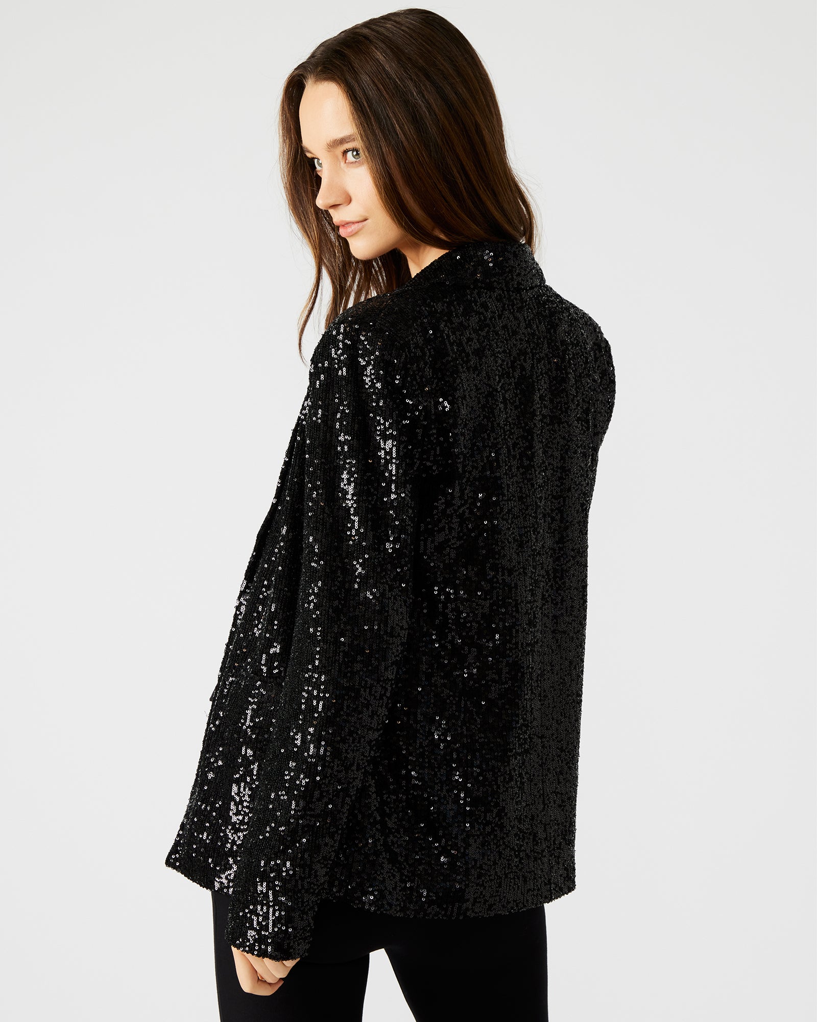 Back angle of sequin blazer men wear for upscale events, highlighting tailored fit.