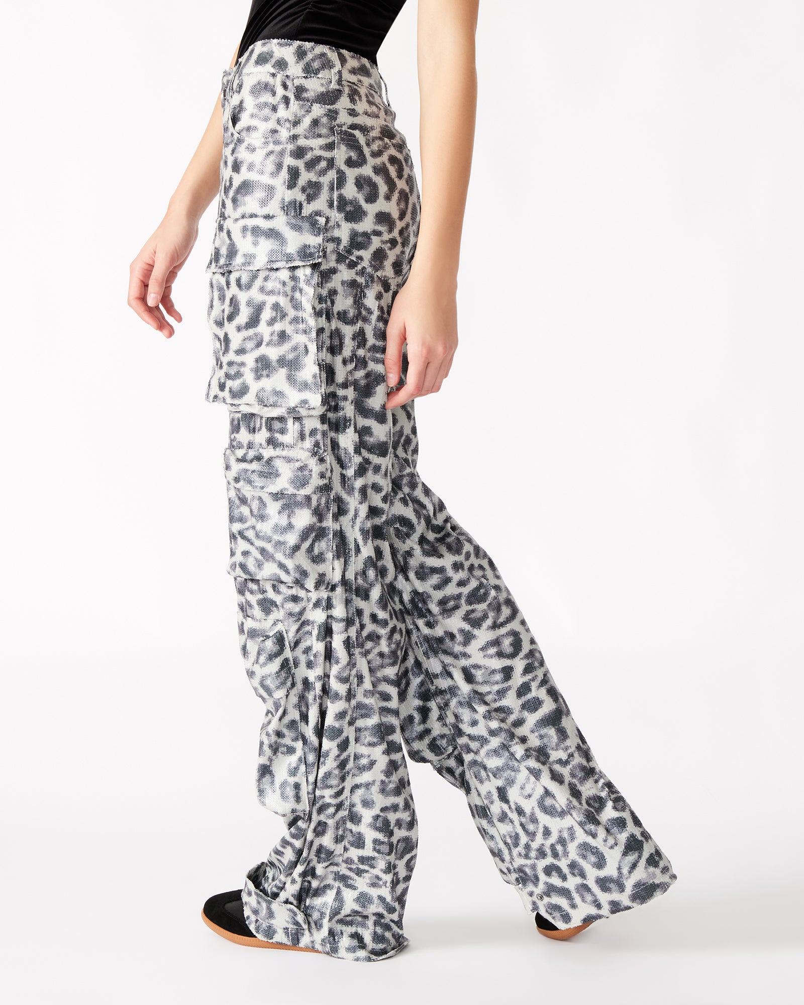 Front view of leopard print sequin cargo pants showcasing adjustable ankle straps.