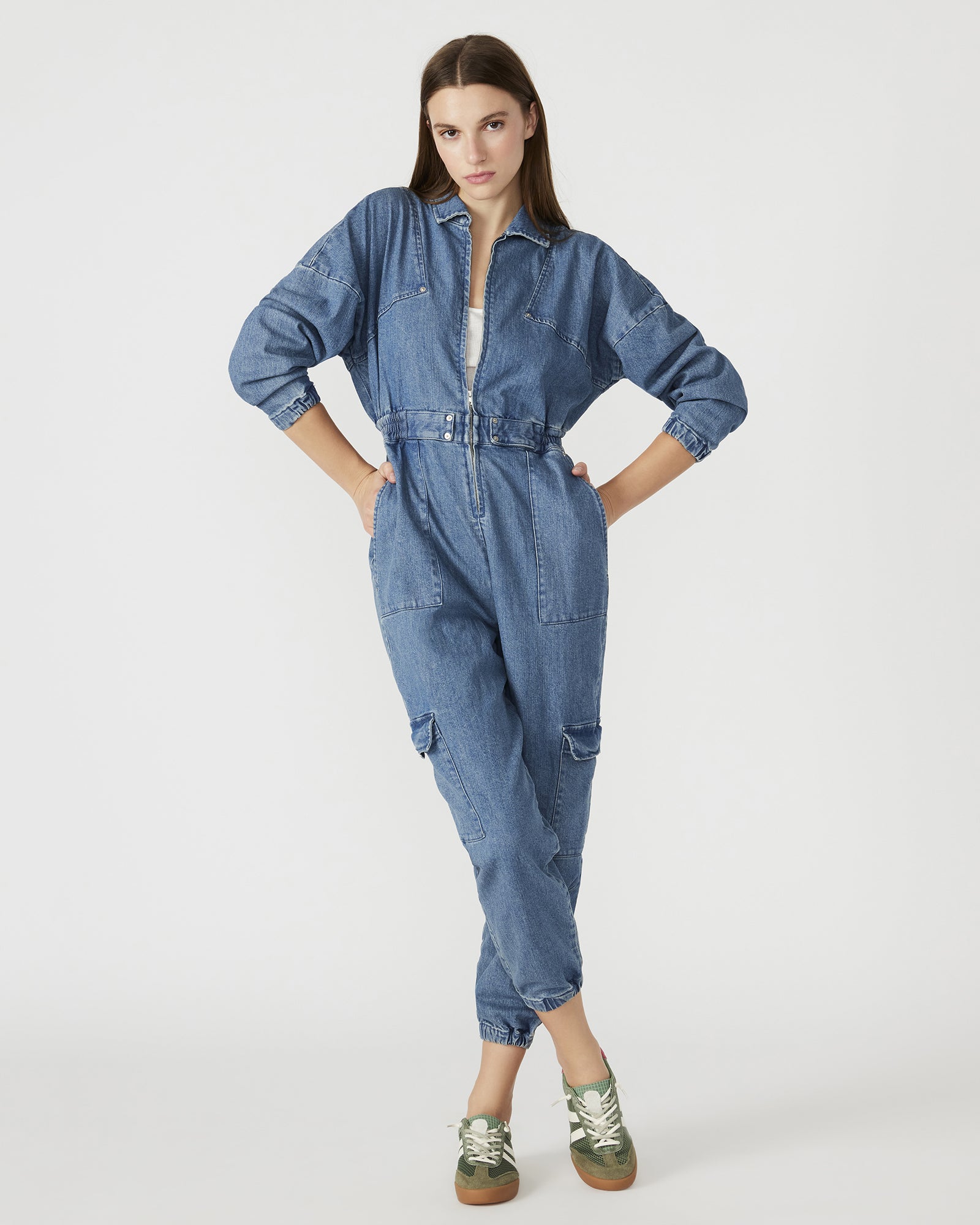 Front view of the Trista long sleeve denim jumpsuit showcasing its zip closure.