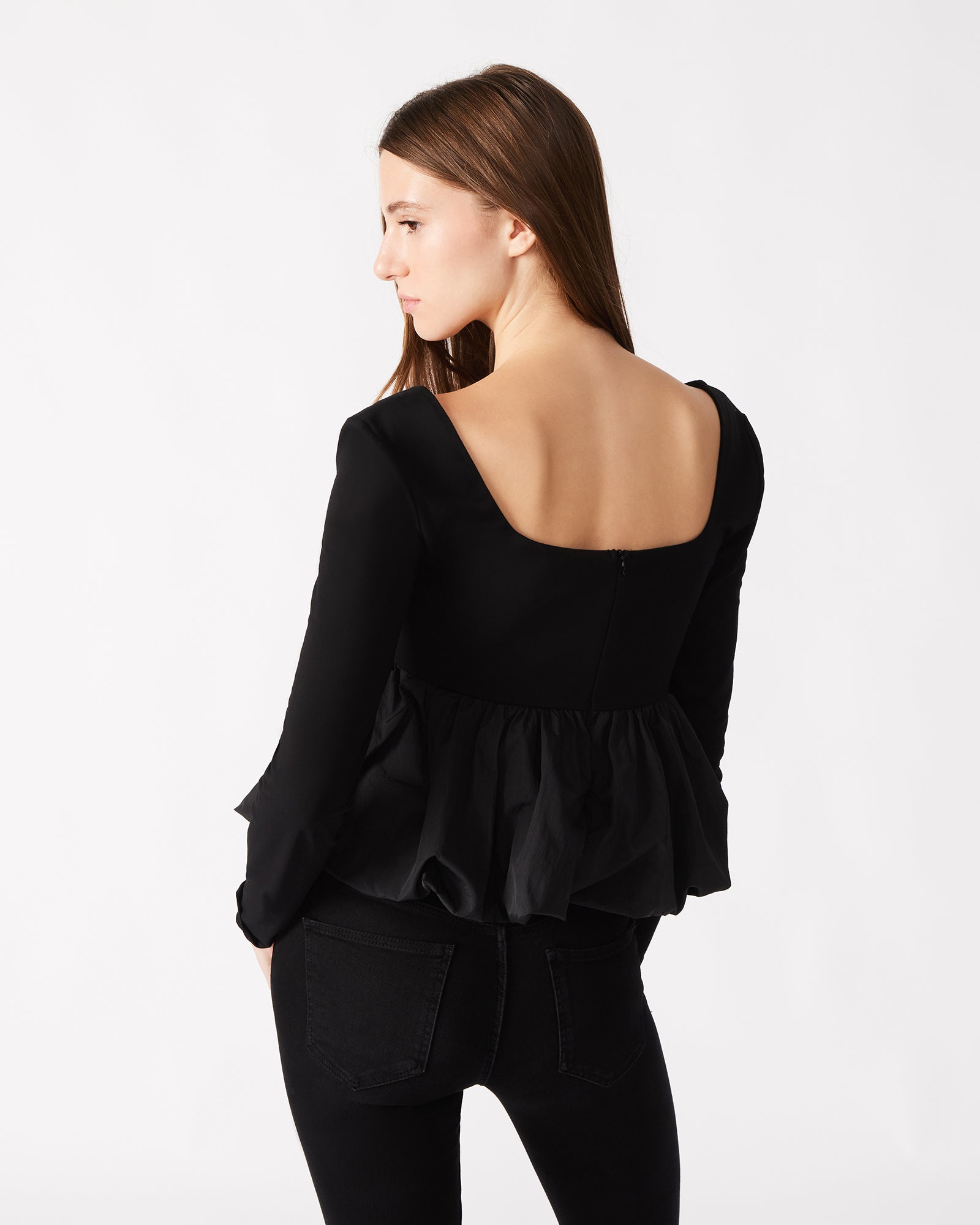 Outfit inspiration: Avielle top paired with high-waisted trousers