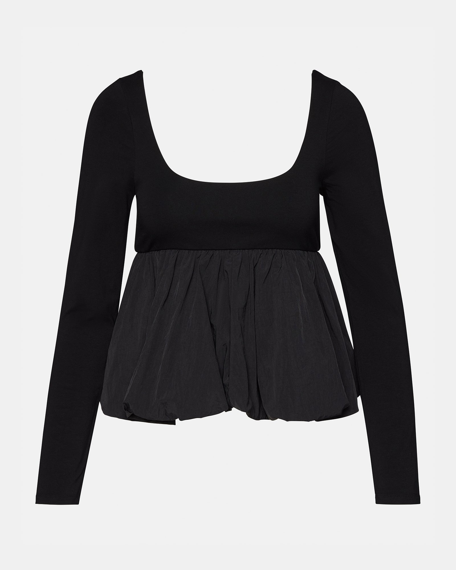 Outfit inspiration: Avielle top paired with high-waisted trousers