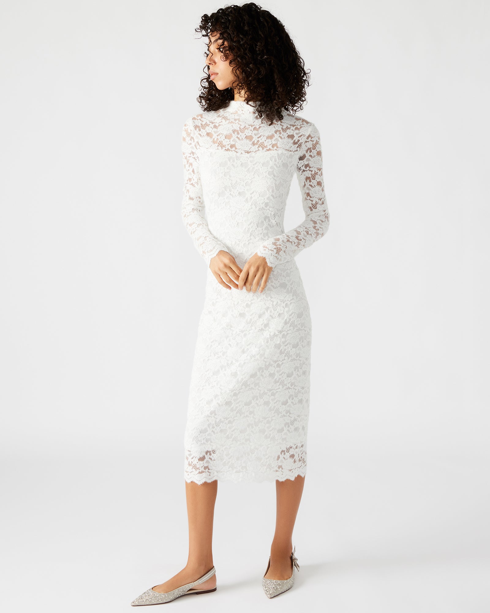 Front view of the ivory lace midi dress showing mesh texture and thumbhole sleeves.