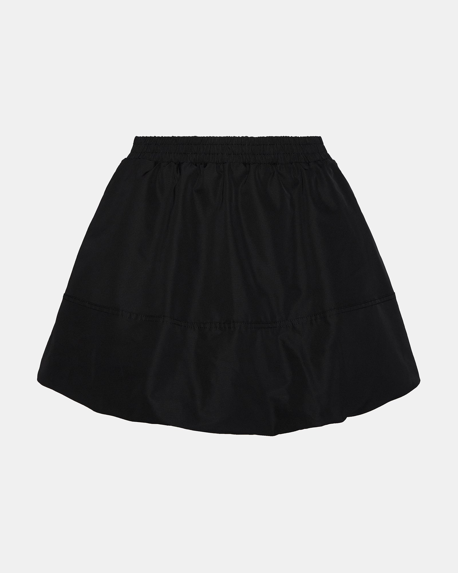 Side view of the black mini skirt, highlighting the zipper closure.