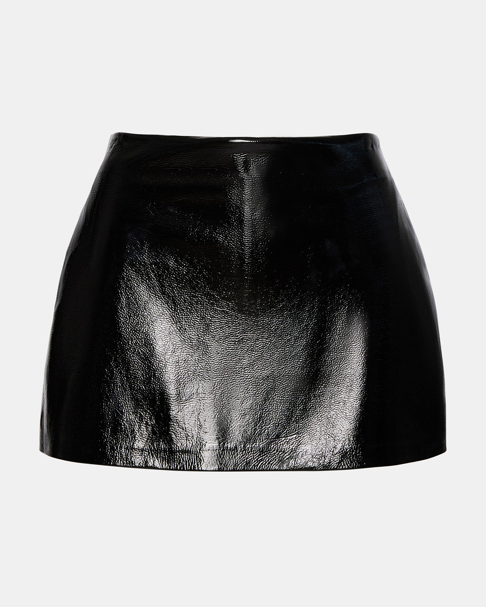Model wearing the skirt with ankle boots, styled for an evening out