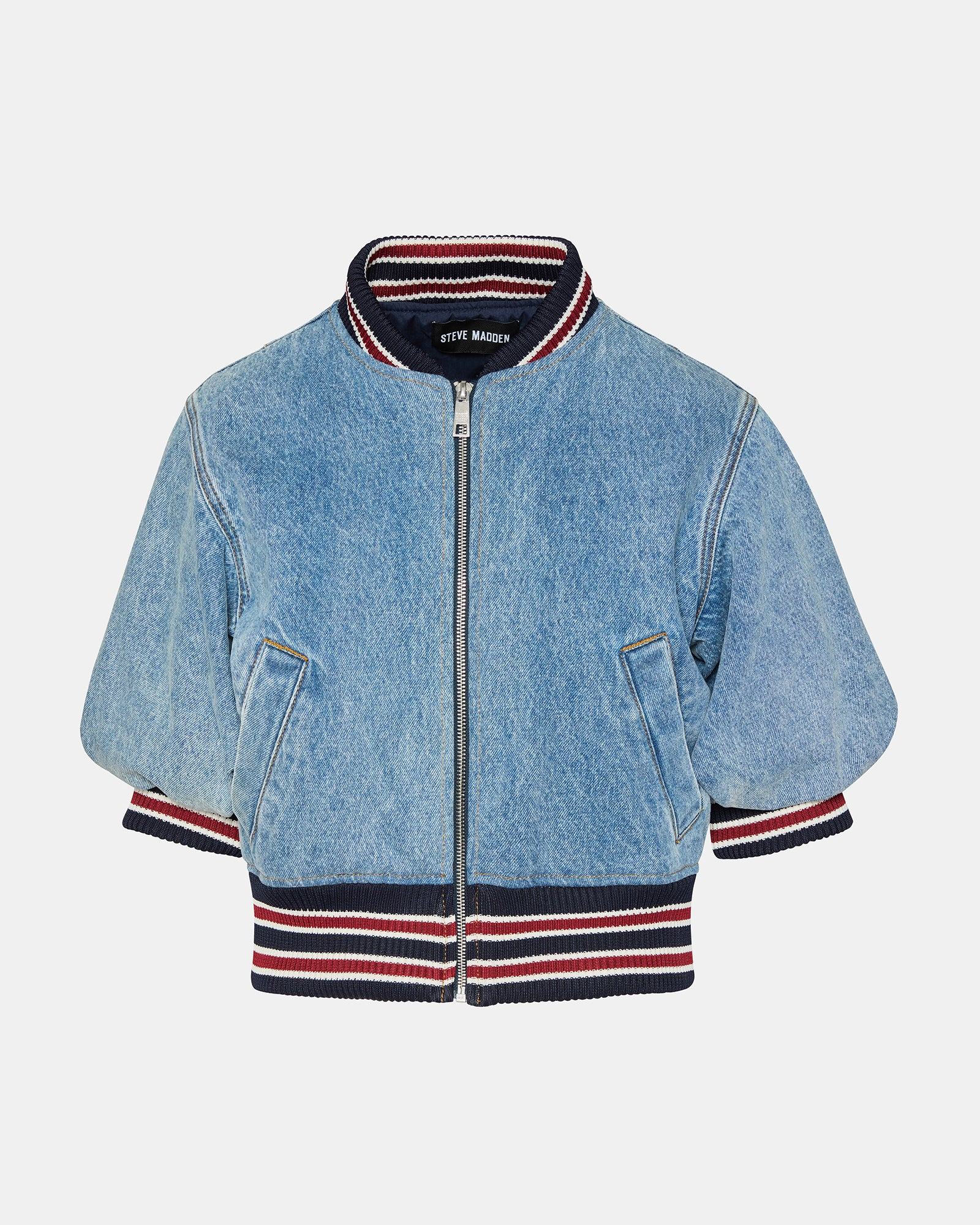 Back detail of zip-up jacket and denim texture shown in natural light