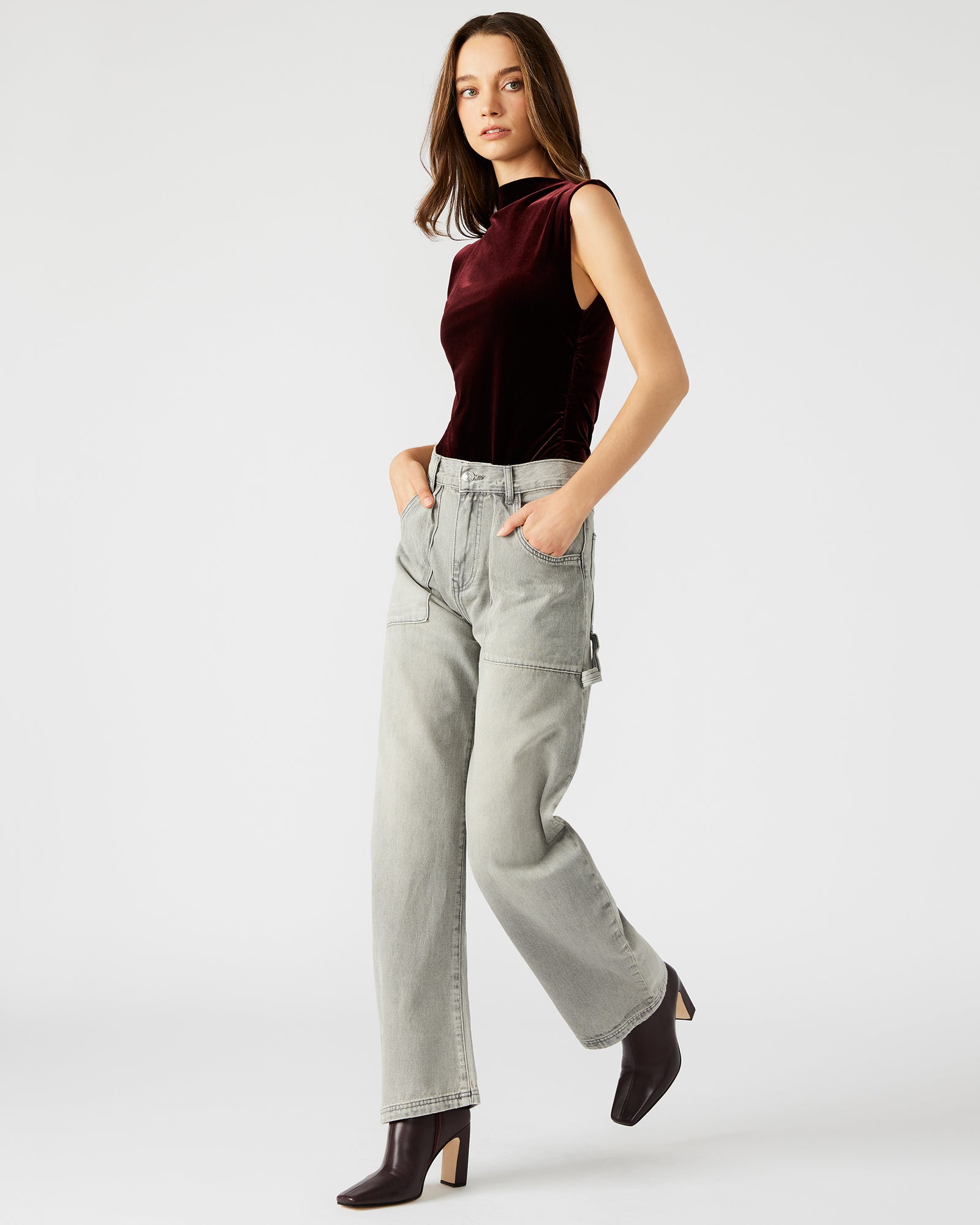 Front view of Hansen light grey barrel leg pants on a model, highlighting the fit.