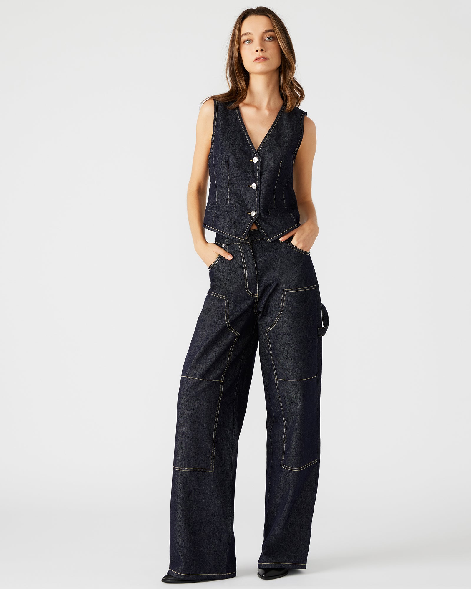 Side view of ASHYLA wide-leg denim jeans showcasing the pocket detail.