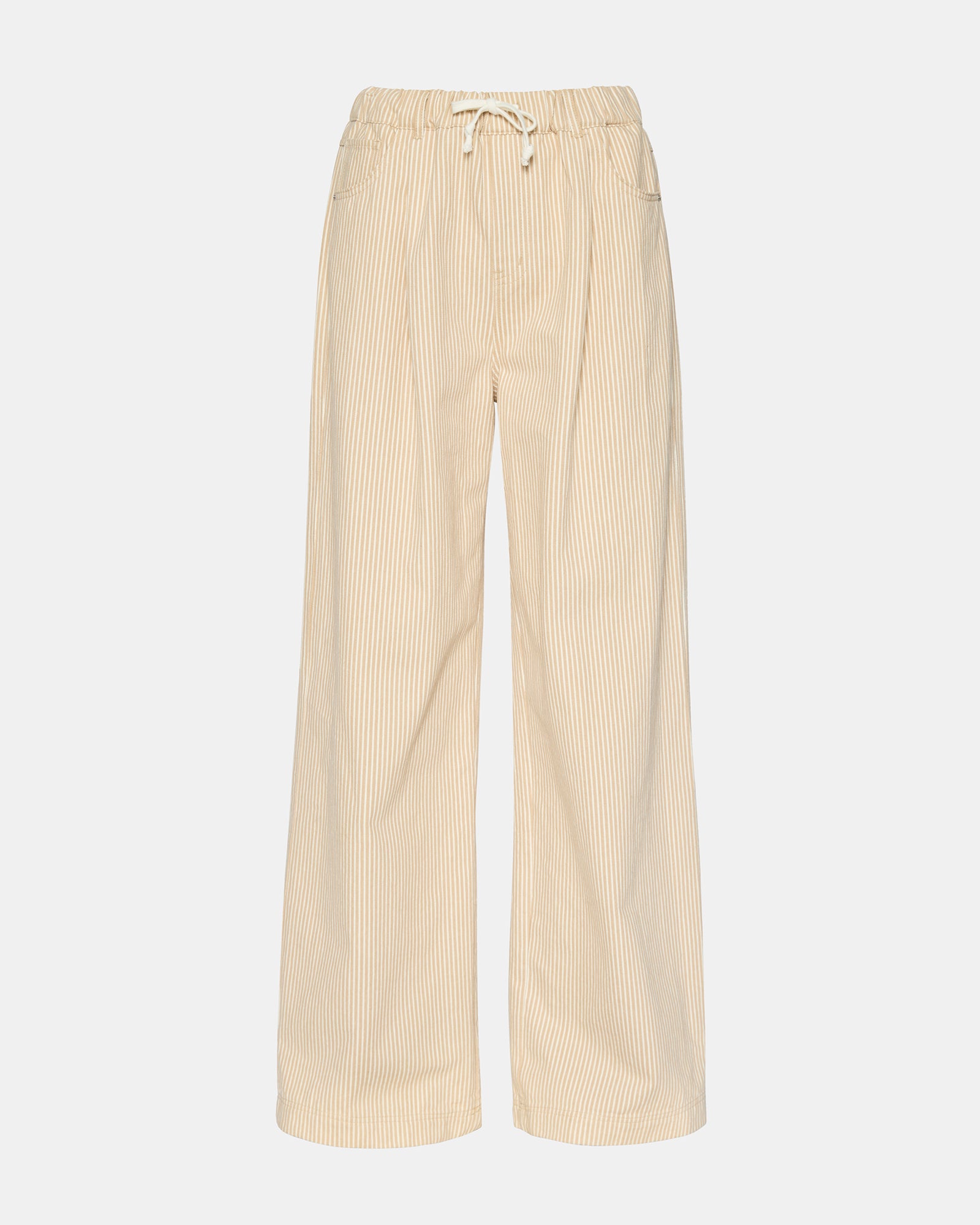 Side angle of wide leg linen pants worn during a casual stroll