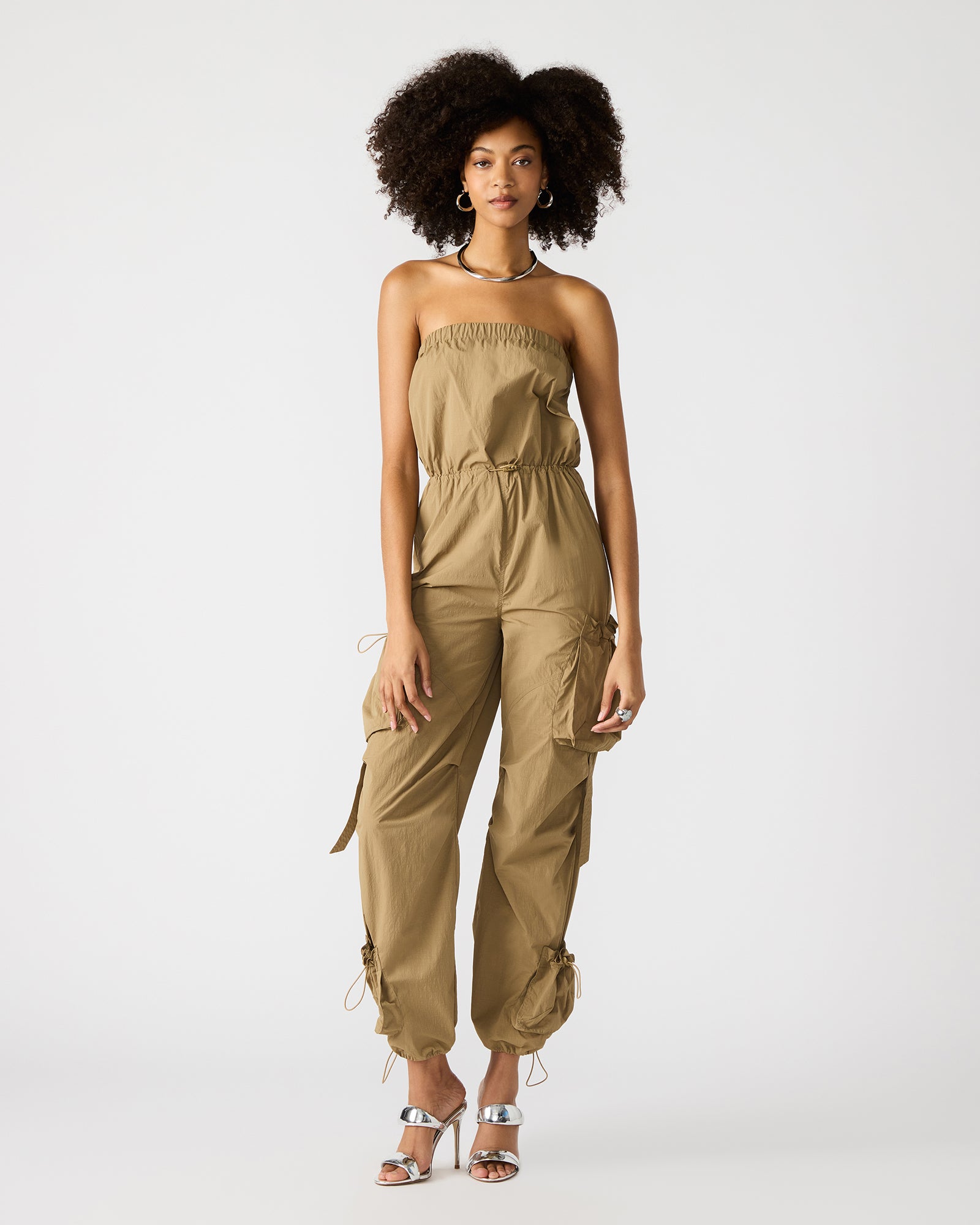 Close-up of the KYLO ladies strapless jumpsuit showcasing cargo pockets