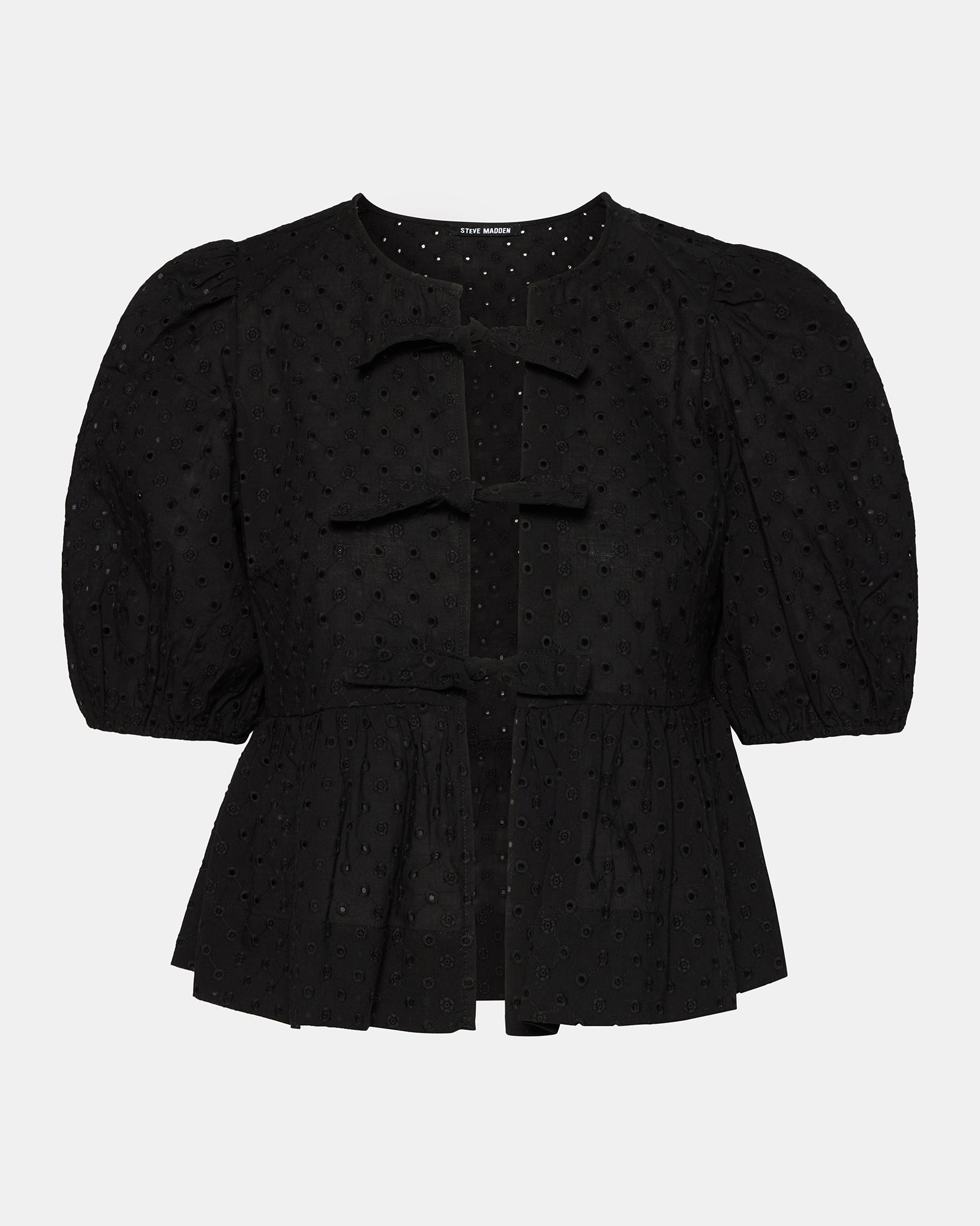 Side view showcasing the tie at the front of the black top.