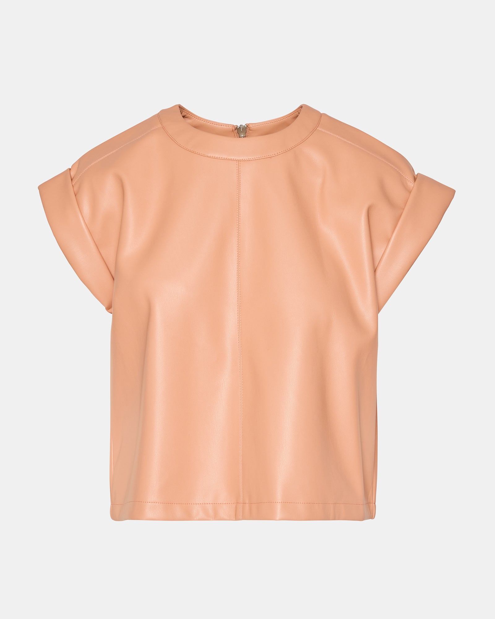 Front view of chic faux leather zipper back top on model