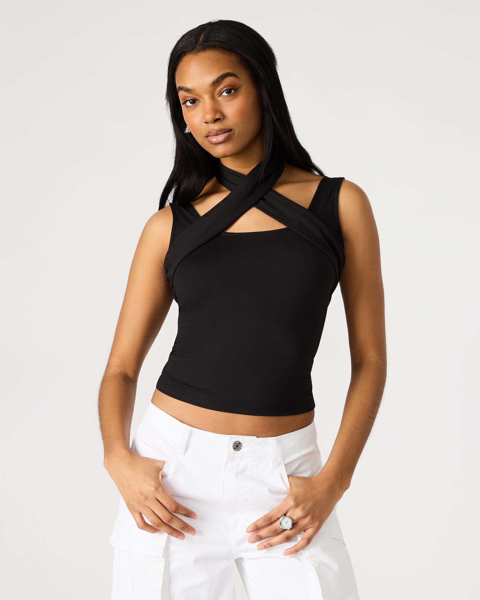 Close-up of the Percy black halter top's crisscross design