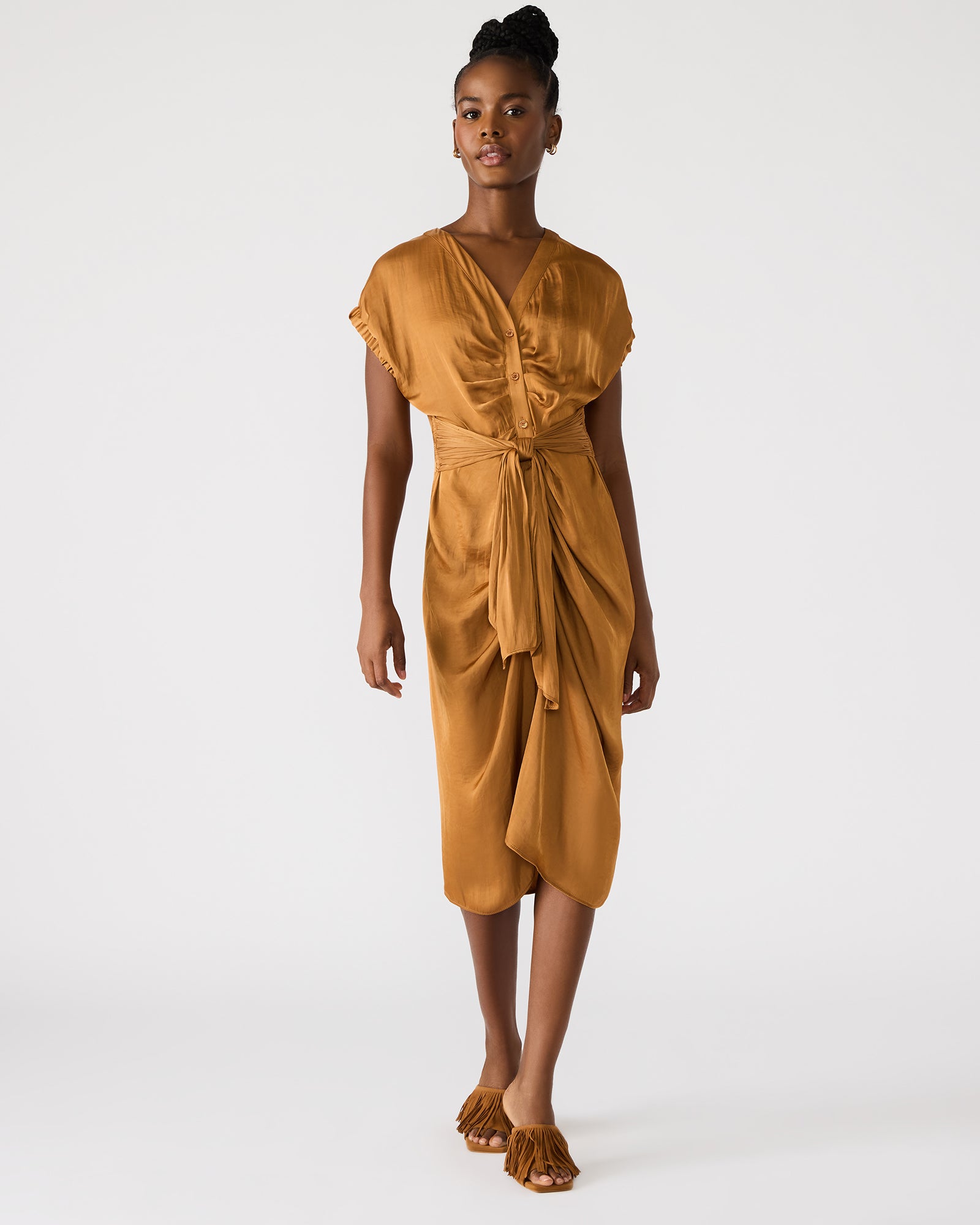Model wearing the Bruno midi dress with button-up closure, styled for a casual outing