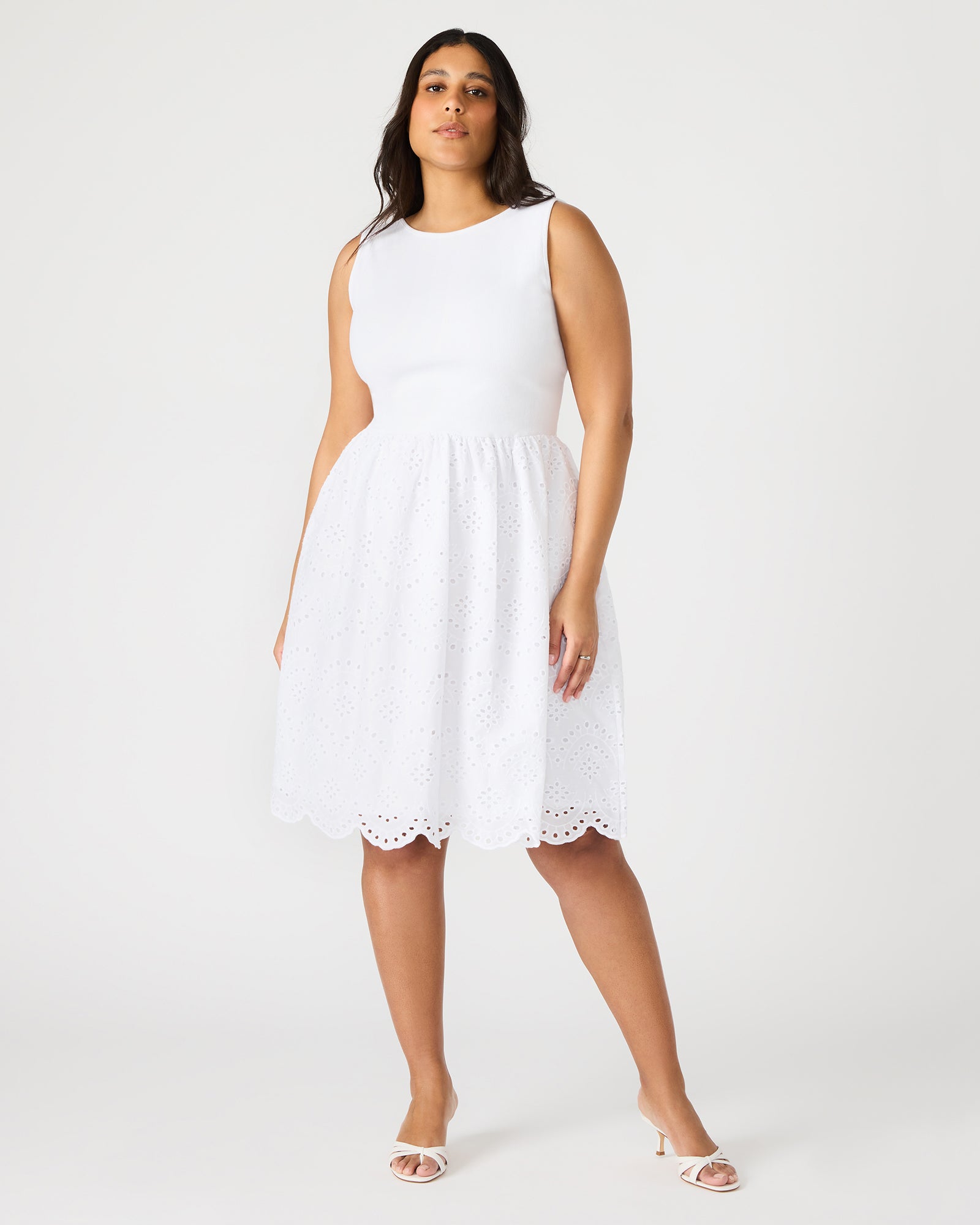 Front view of Julian white midi dress with scalloped edge.