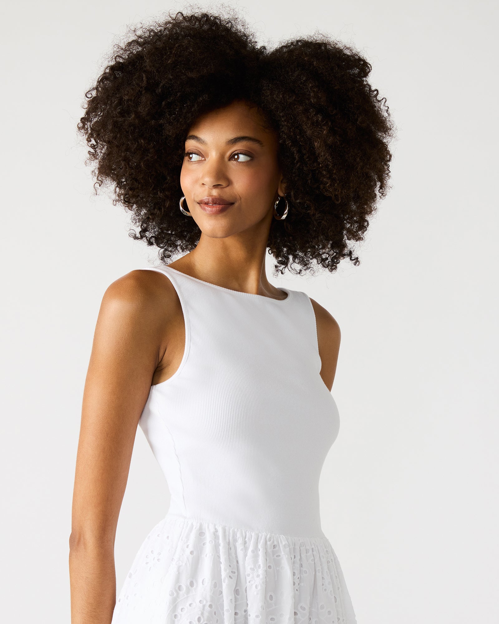 Front view of Julian white midi dress with scalloped edge.