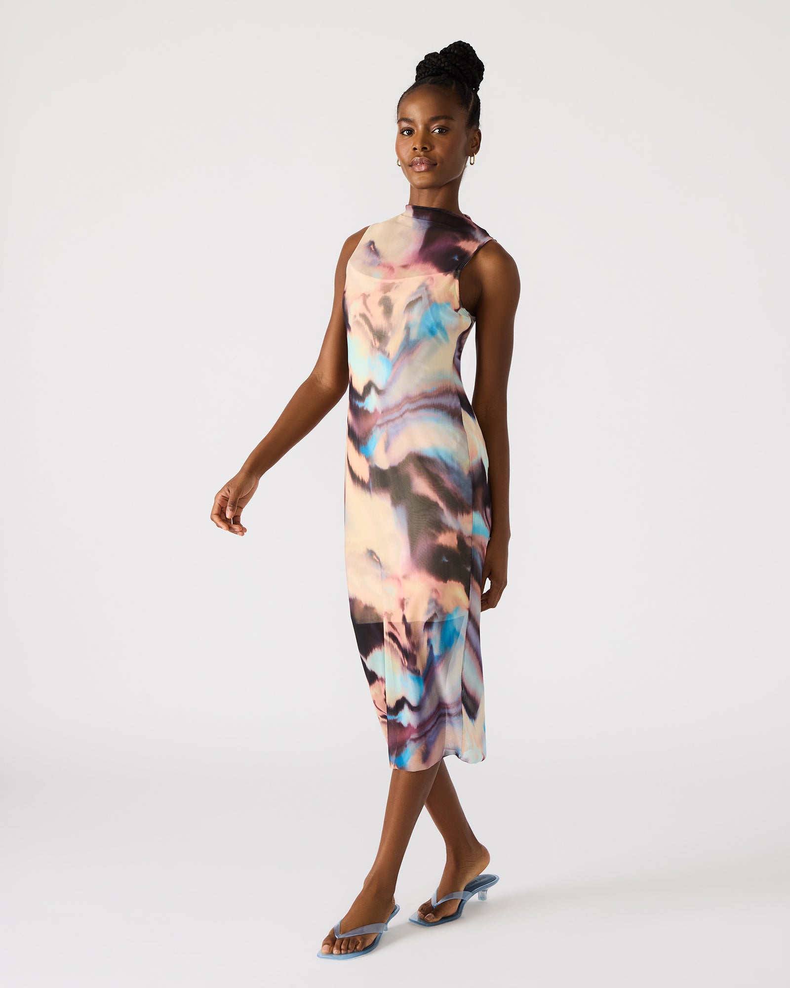 Full length of the red midi dress, perfect for summer gatherings.