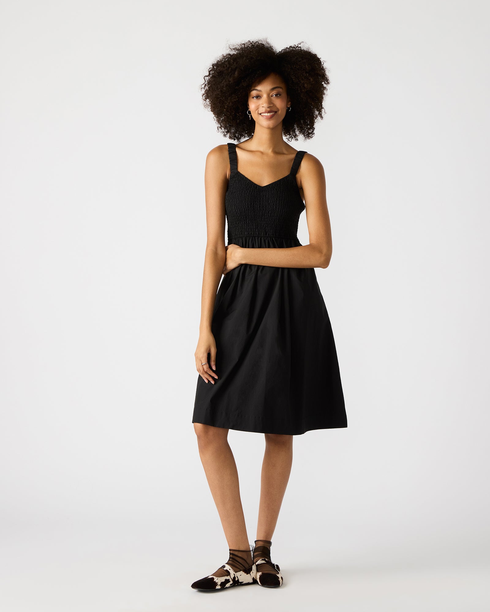 Close-up of the Fleur dresss functional pockets and flowy hem