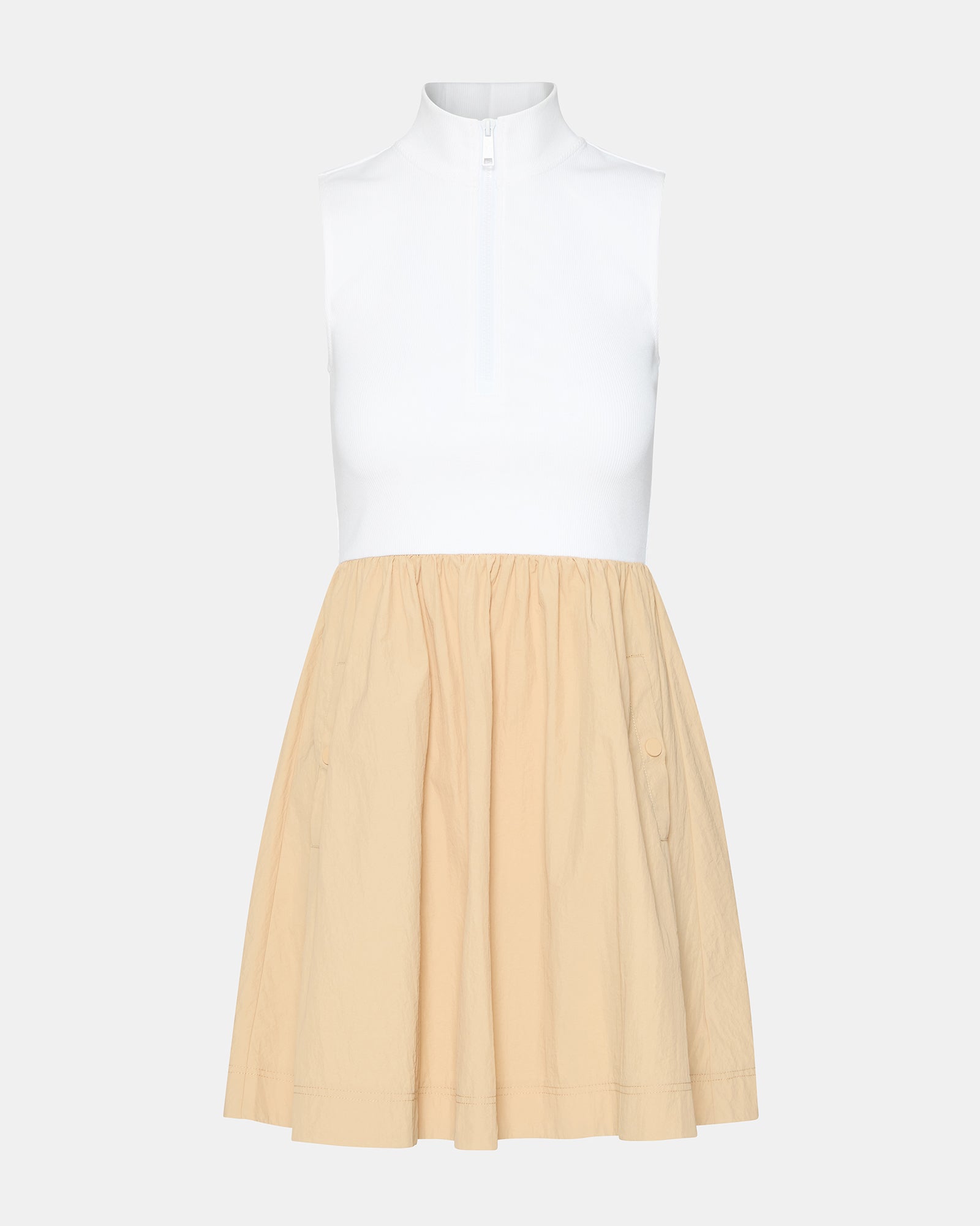 Side angle of long sleeveless dress dress worn outdoors on a warm Charleston morning.