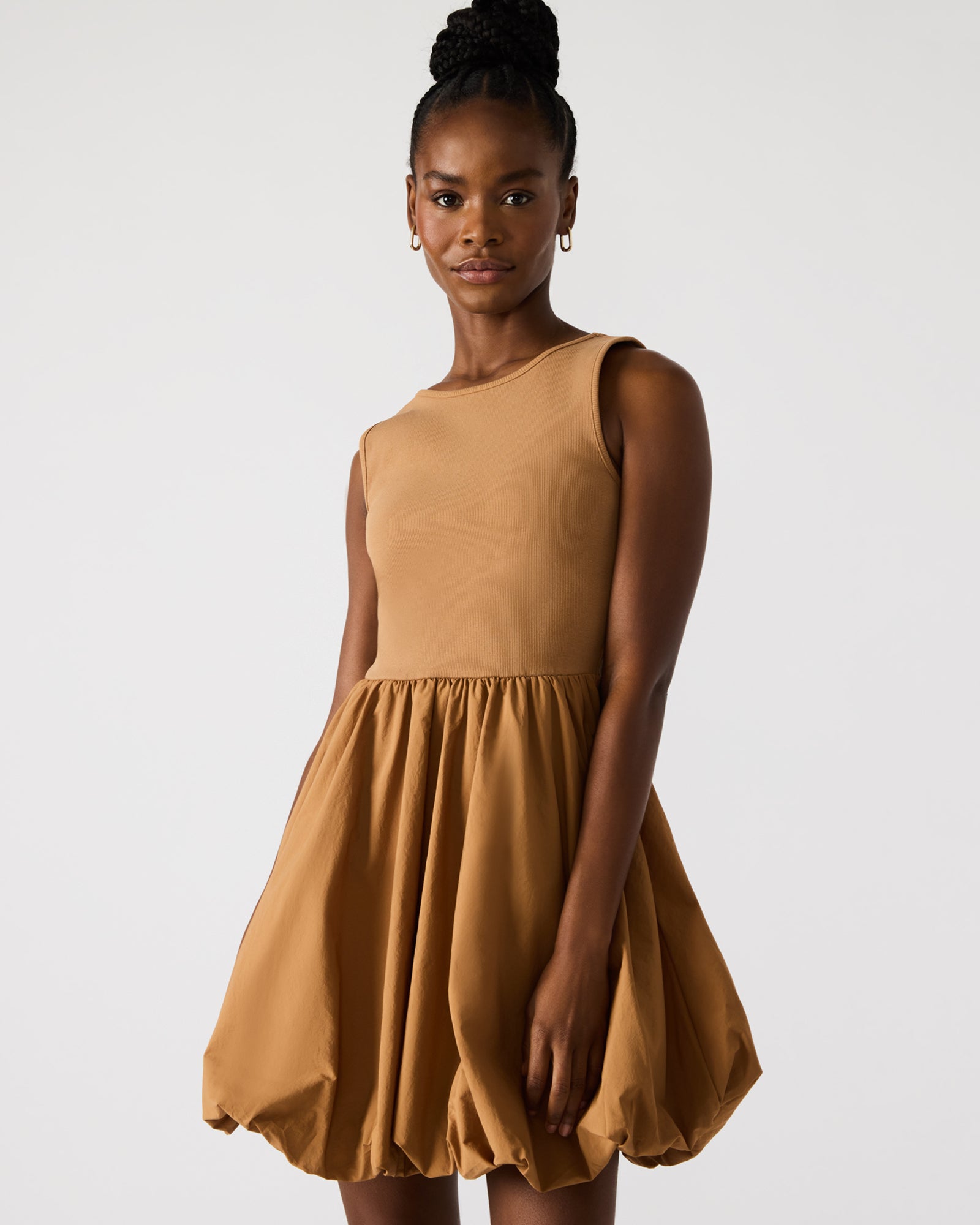Back angle of bubble hem dress for versatile styling ideas