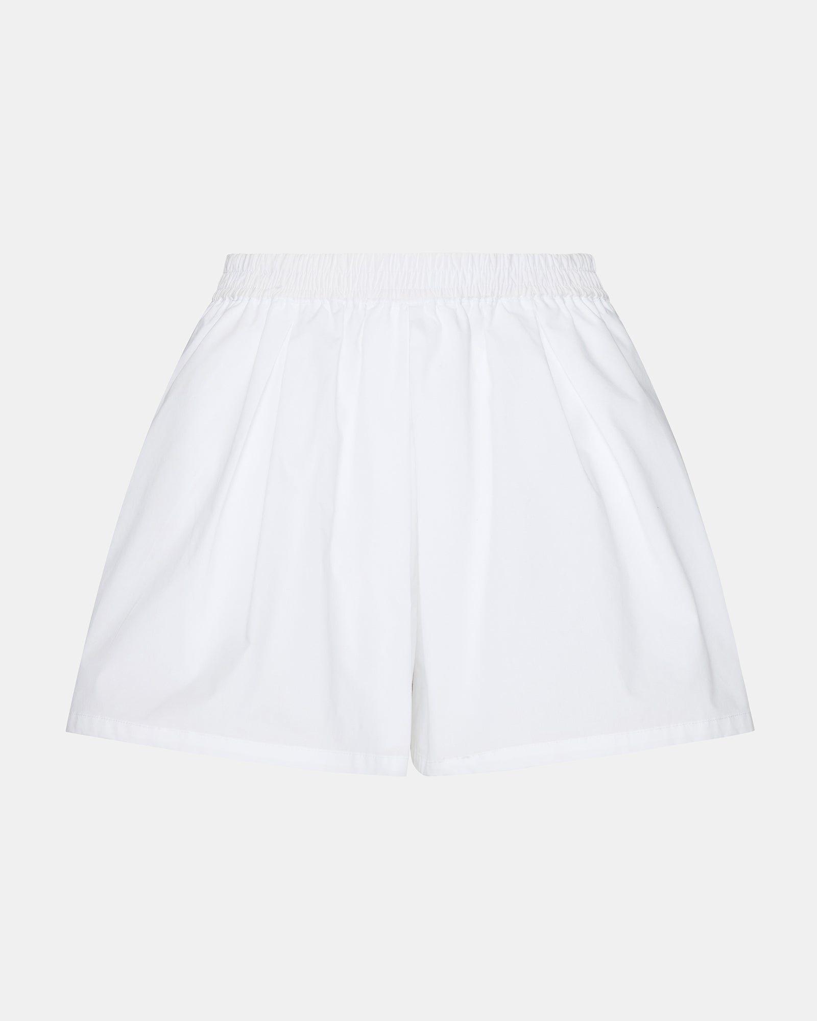 Close-up of Malena white denim shorts highlighting the front pockets.