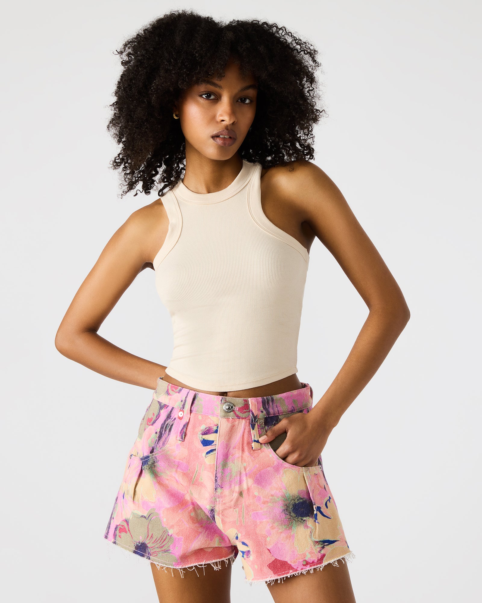 Side view of womens floral shorts, highlighting functional pockets.