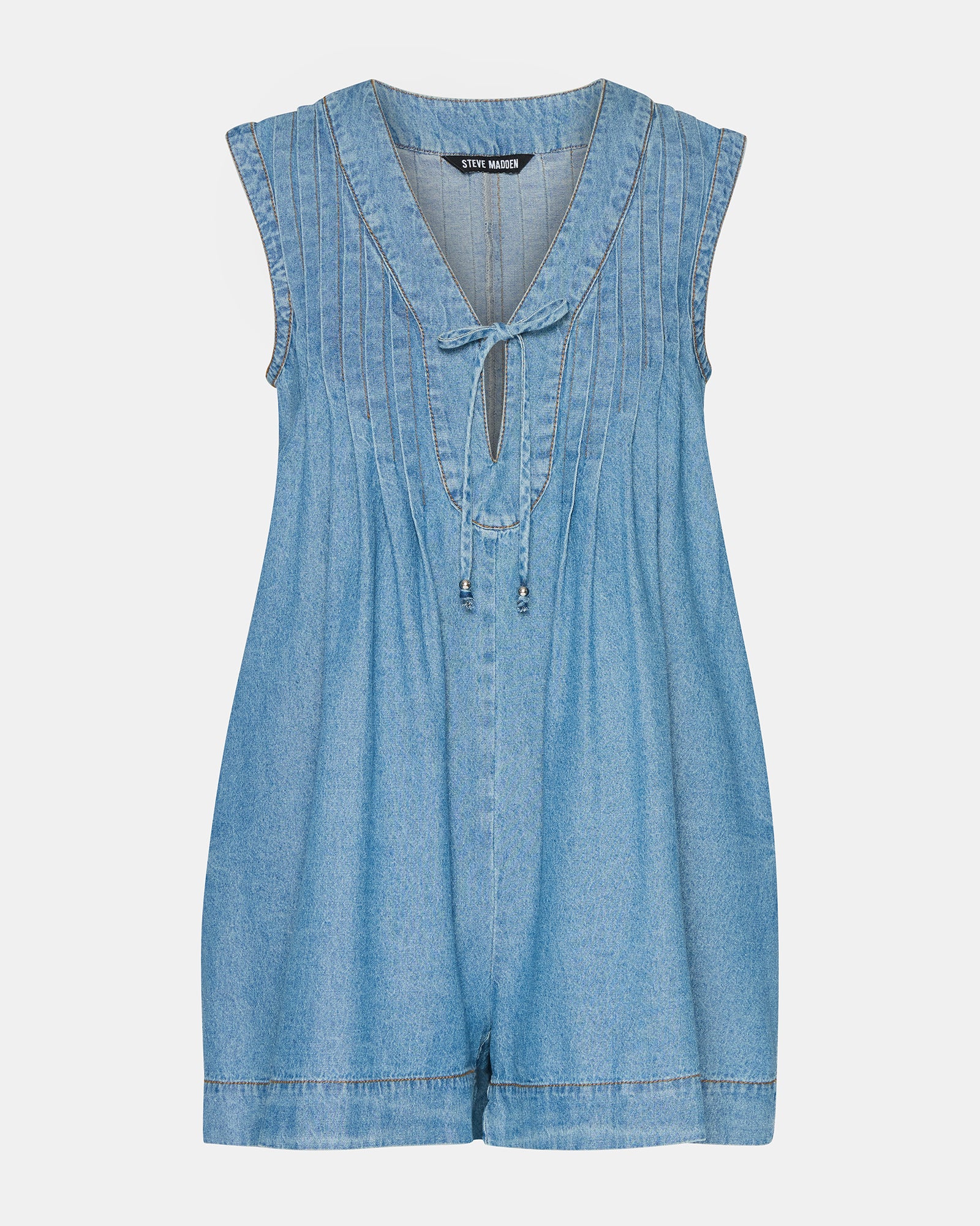Flat lay of the black denim romper with accessories for styling inspiration.