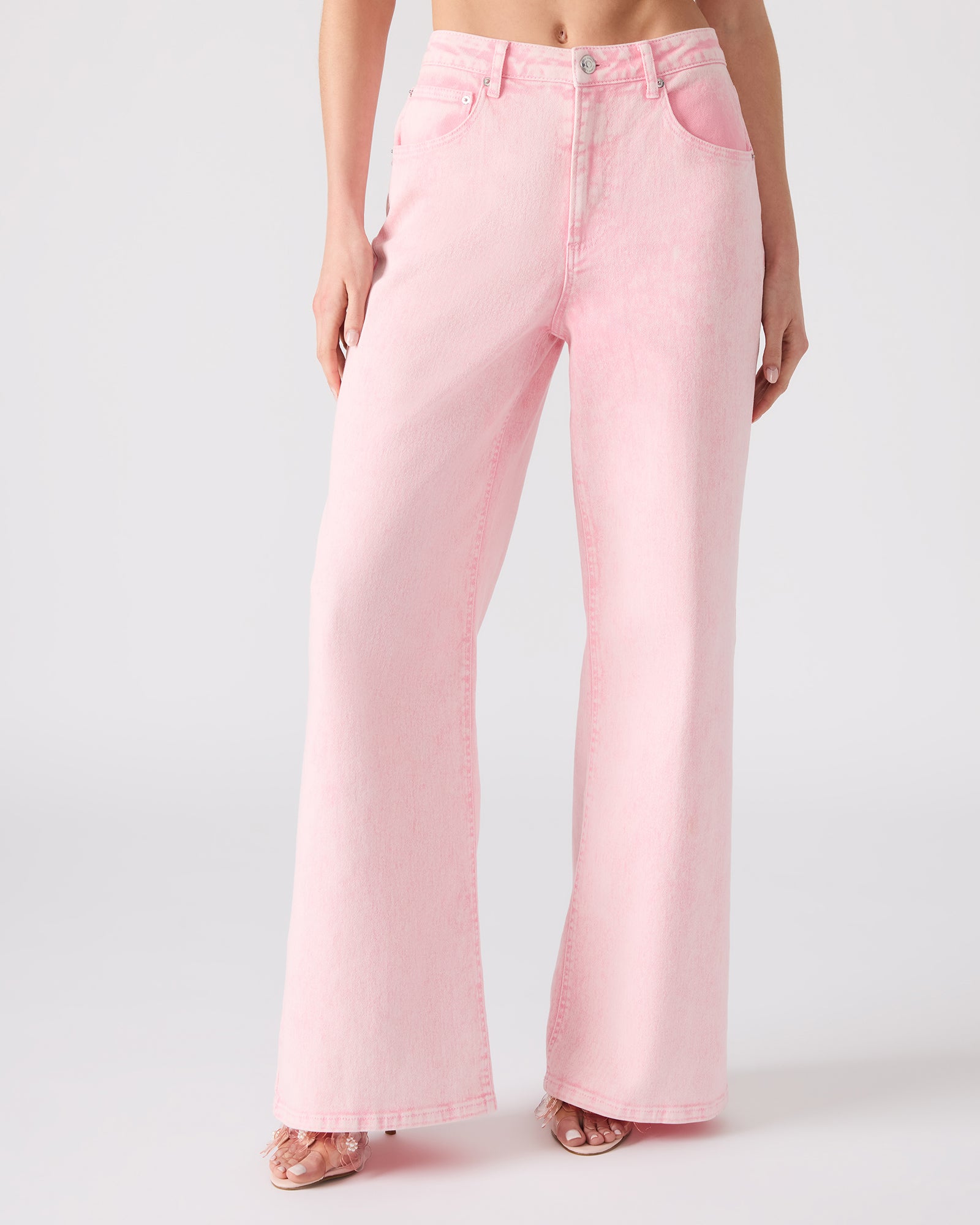 Model wearing the Roz set for matcha, featuring washed denim and stylish wide leg design.