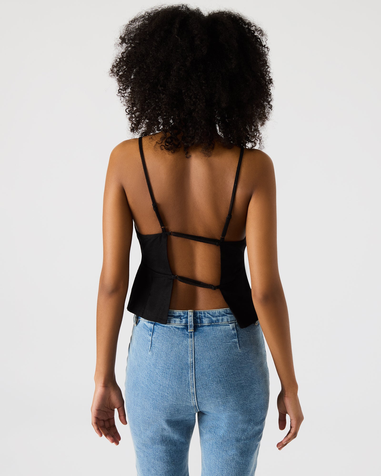 Back view highlighting the elegant strappy design