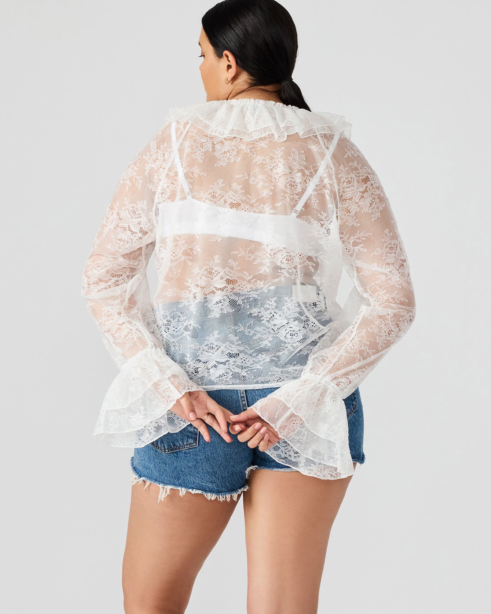 Front view of the Hampton white lace blouse with ruffle sleeves, ideal for elegant womens tops