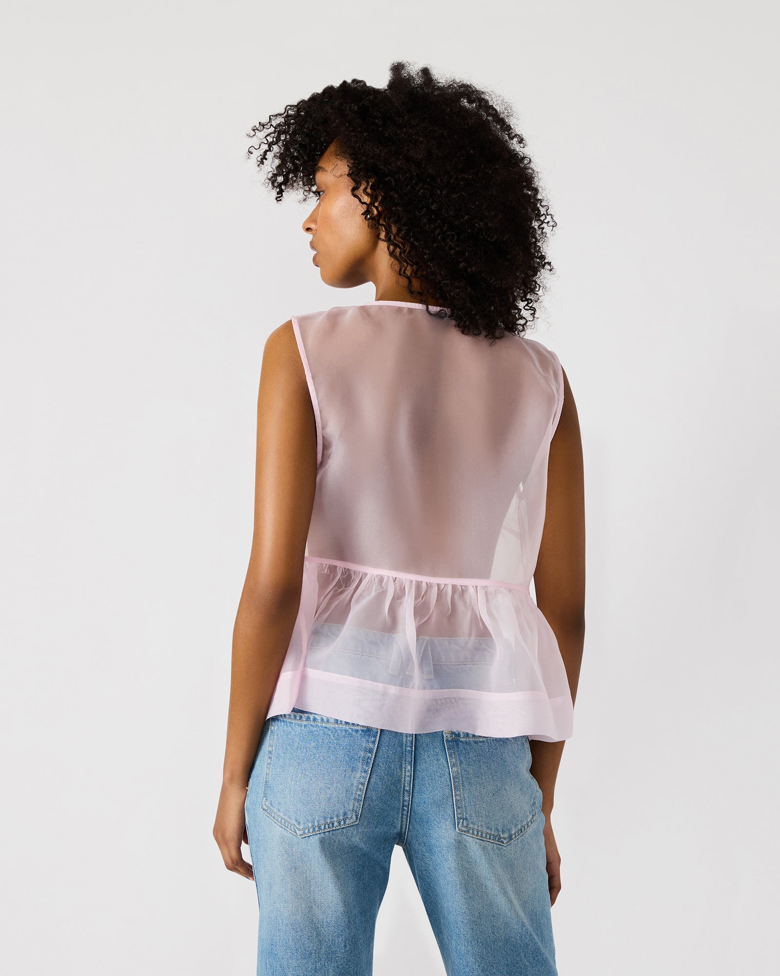Close-up showing bow tie-front detail on elegant top
