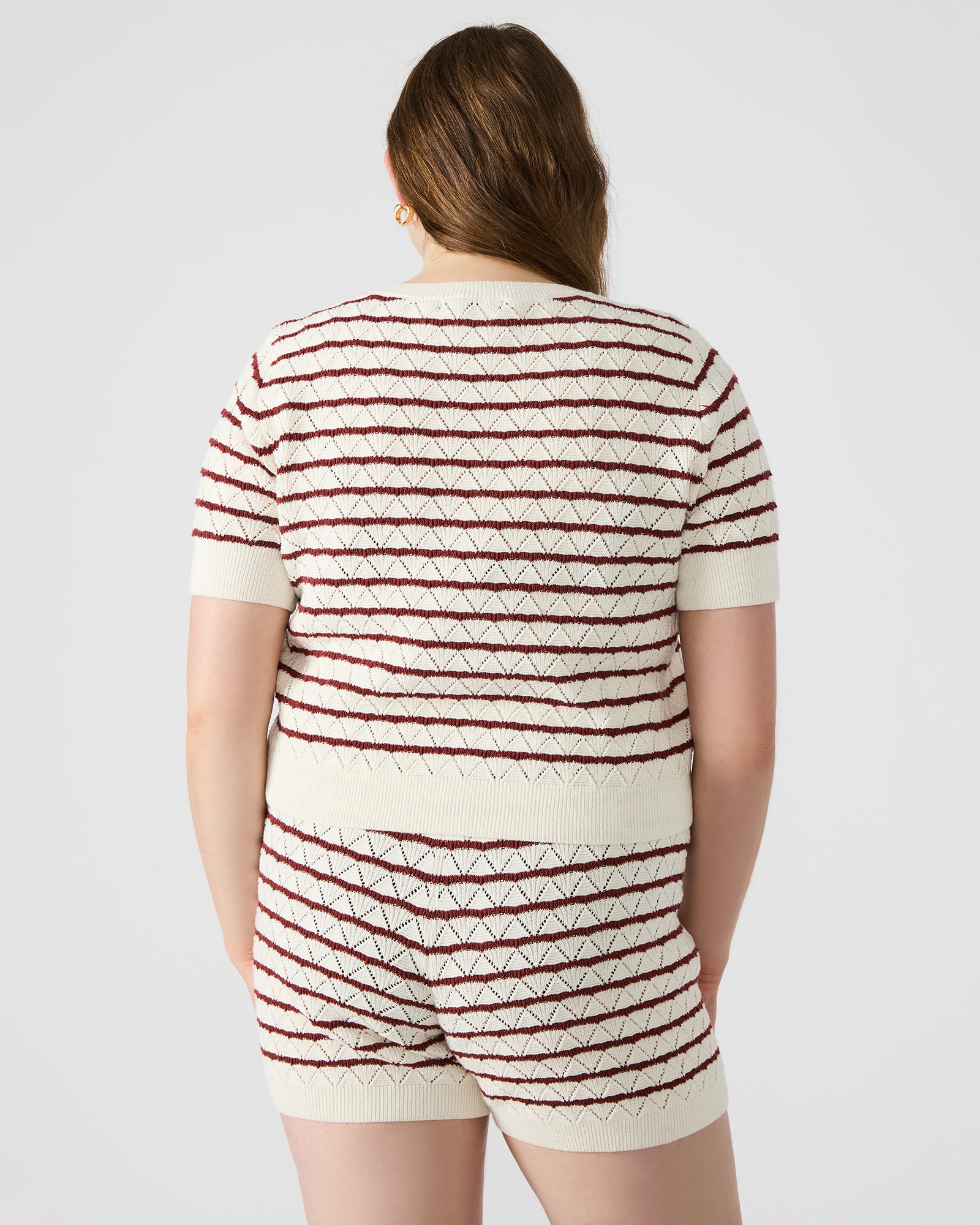 Close-up of Norris Cream Knit Top fabric, highlighting its soft texture.