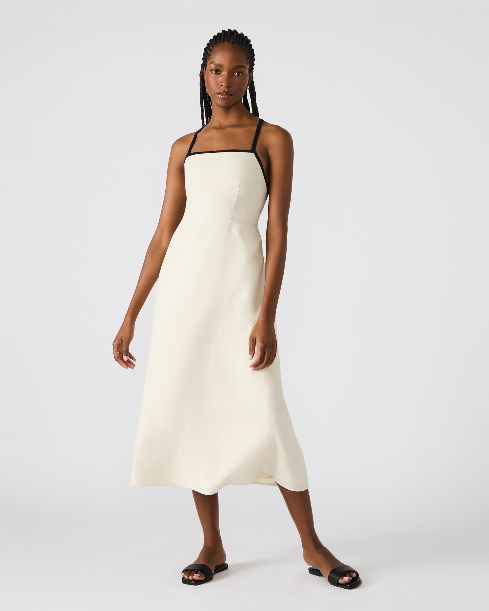 Front view of the pink maxi dress with strappy design
