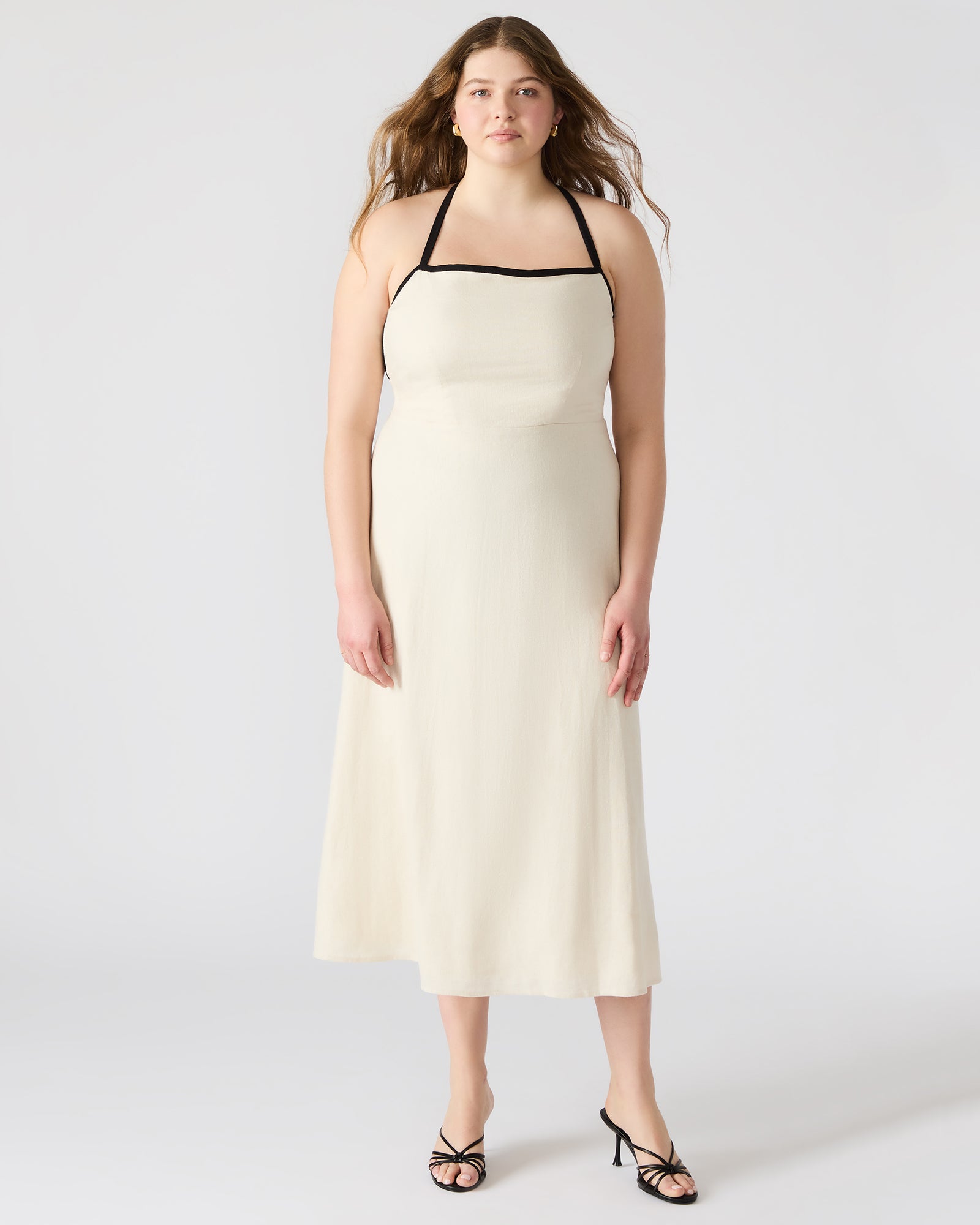 Side view showcasing the flowy silhouette of the maxi dress