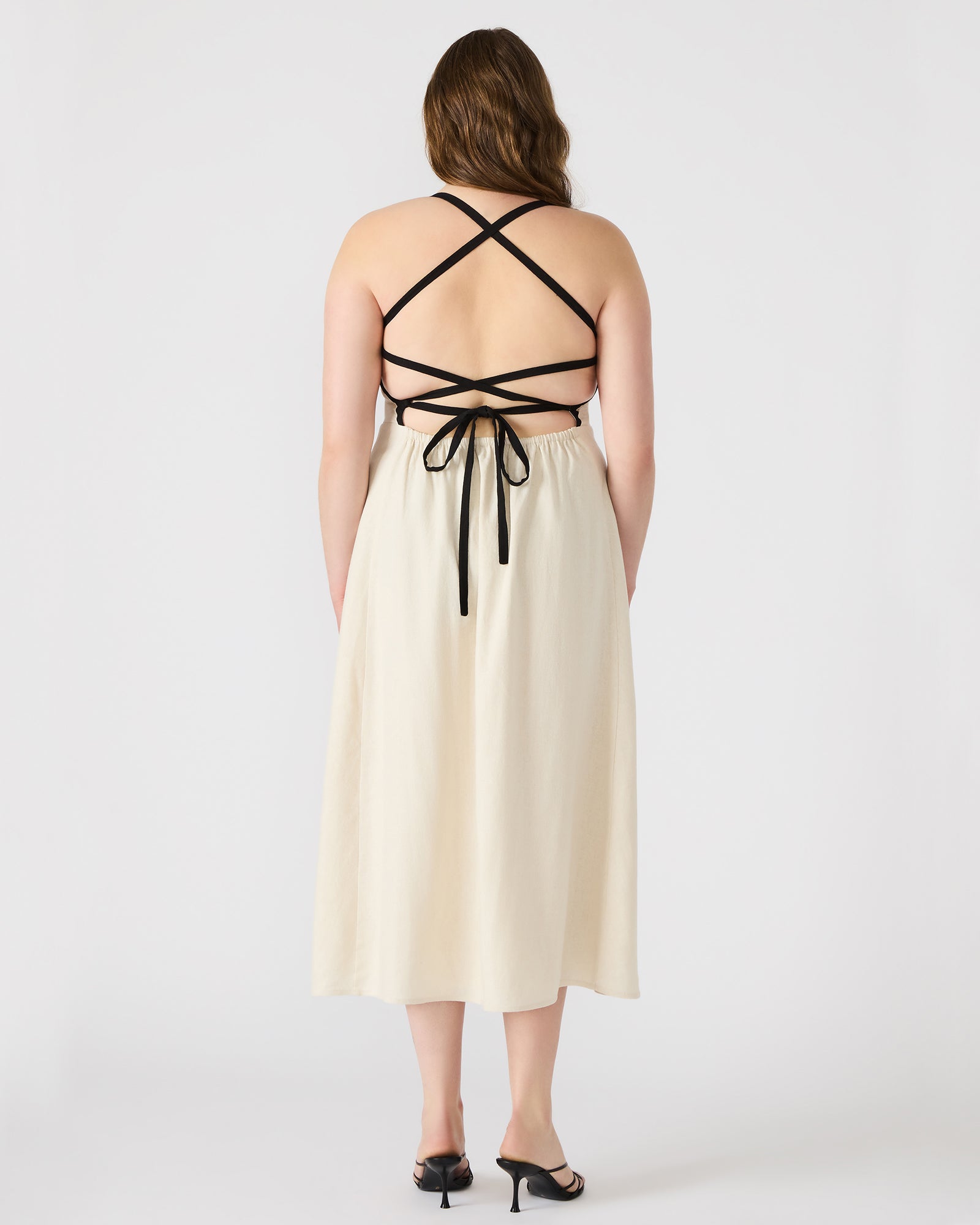 Front view of the pink maxi dress with strappy design