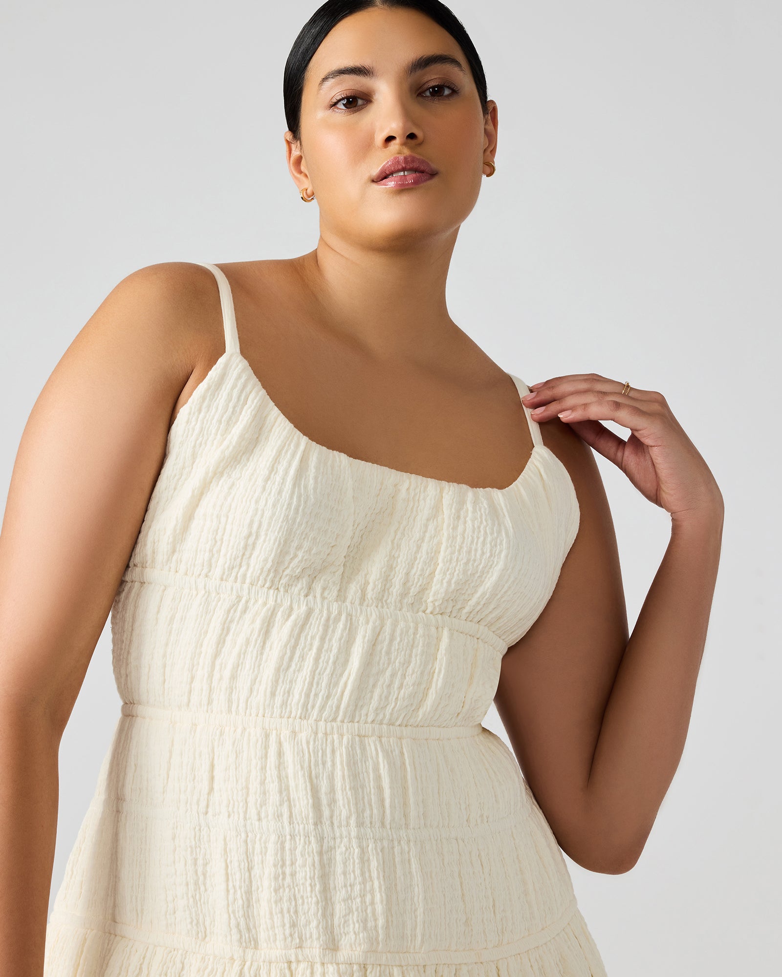 Side profile of maxi dress in motion, ideal for weekend city outings