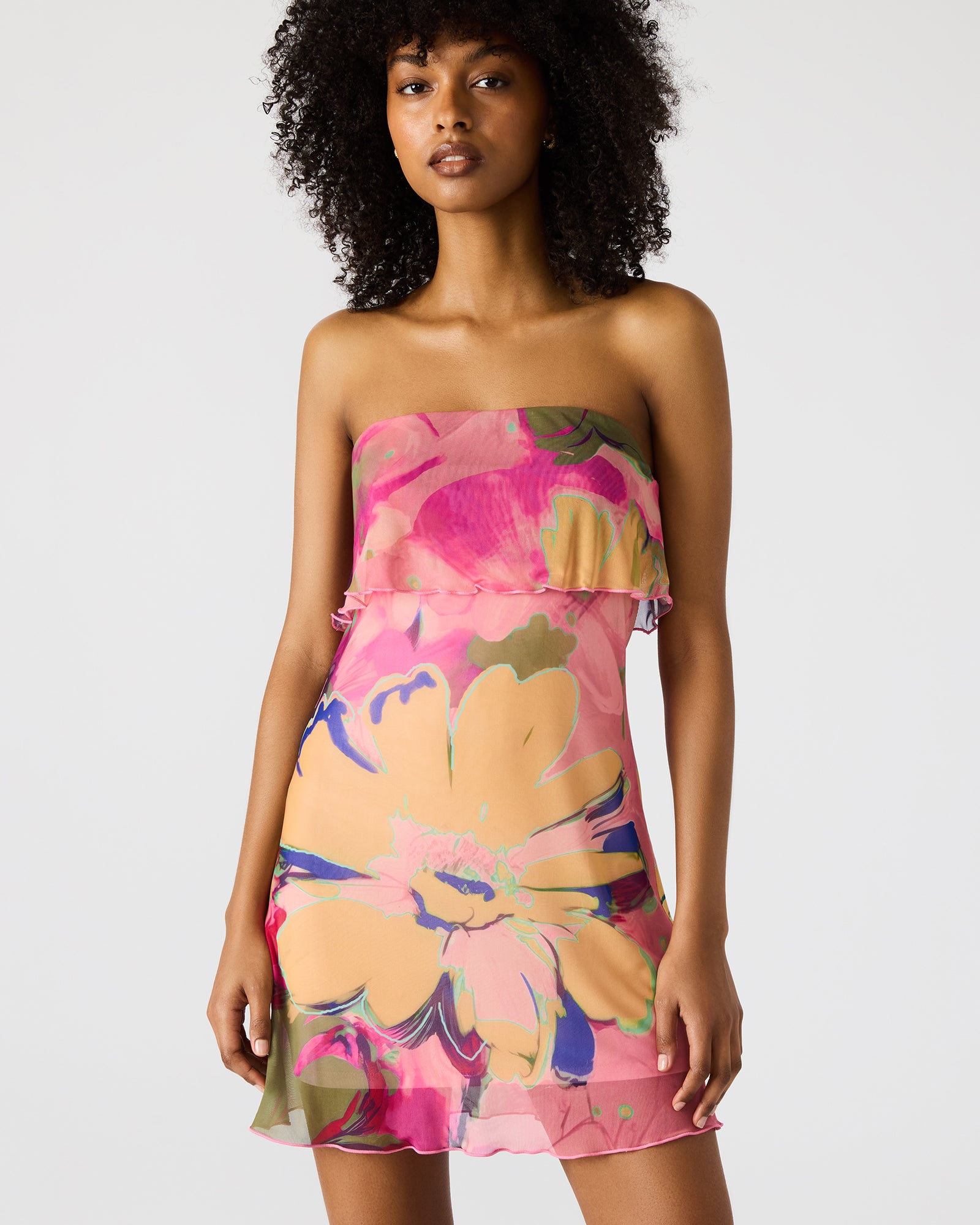 Close-up of floral print and mesh overlay on Bryar dress